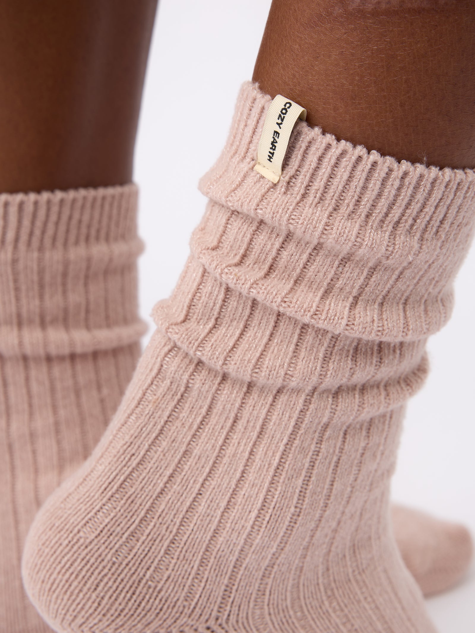Close-up of tag on Cozy Earth Plush Lounge Sock in Dusty Rose
