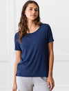 Woman wearing a blue Cozy Earth Rib Knit Short Sleeve Lounge Top and gray shorts against a white background |Color:Navy