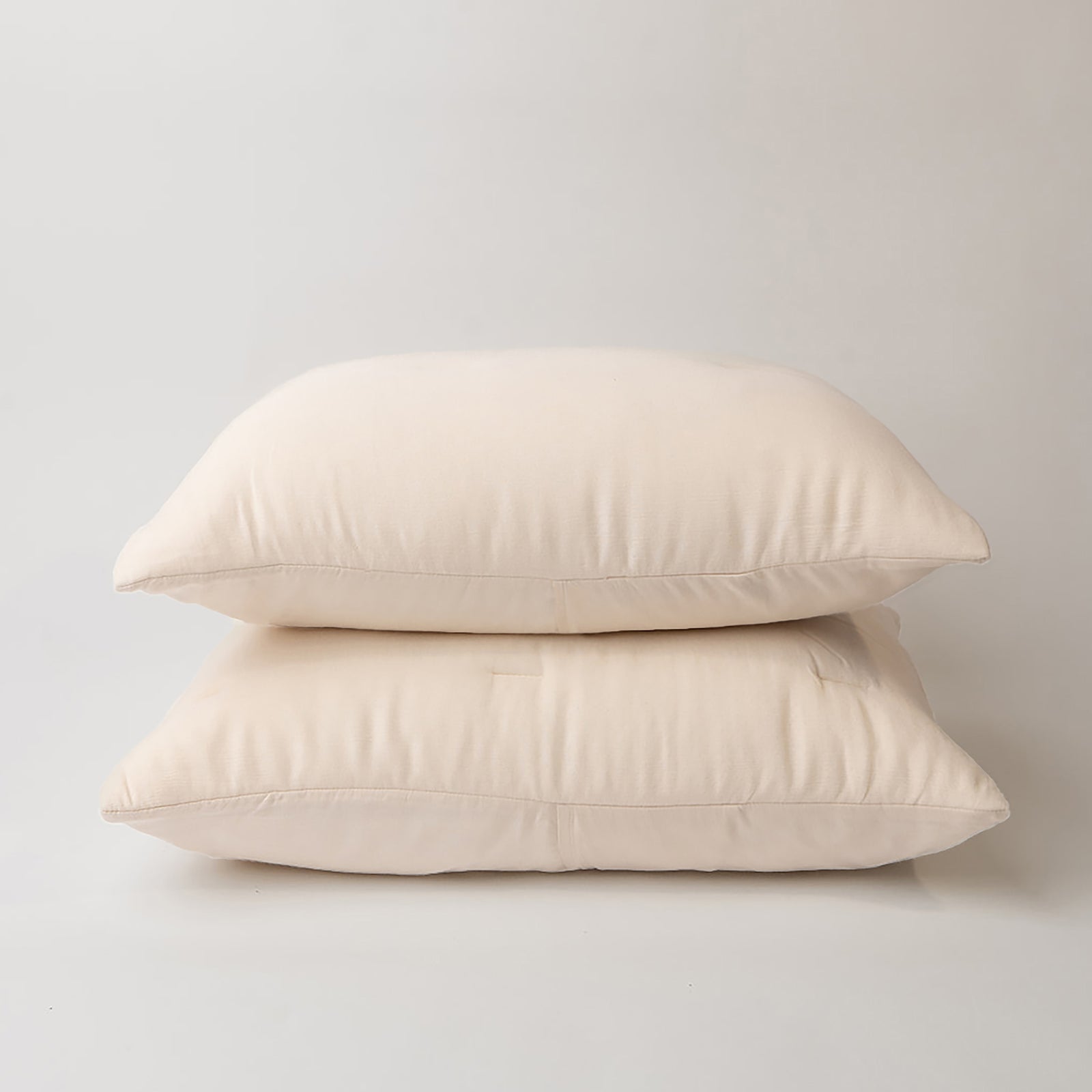 Buttermilk Aire Bamboo Puckered Shams king size. The sham is resting on a white background