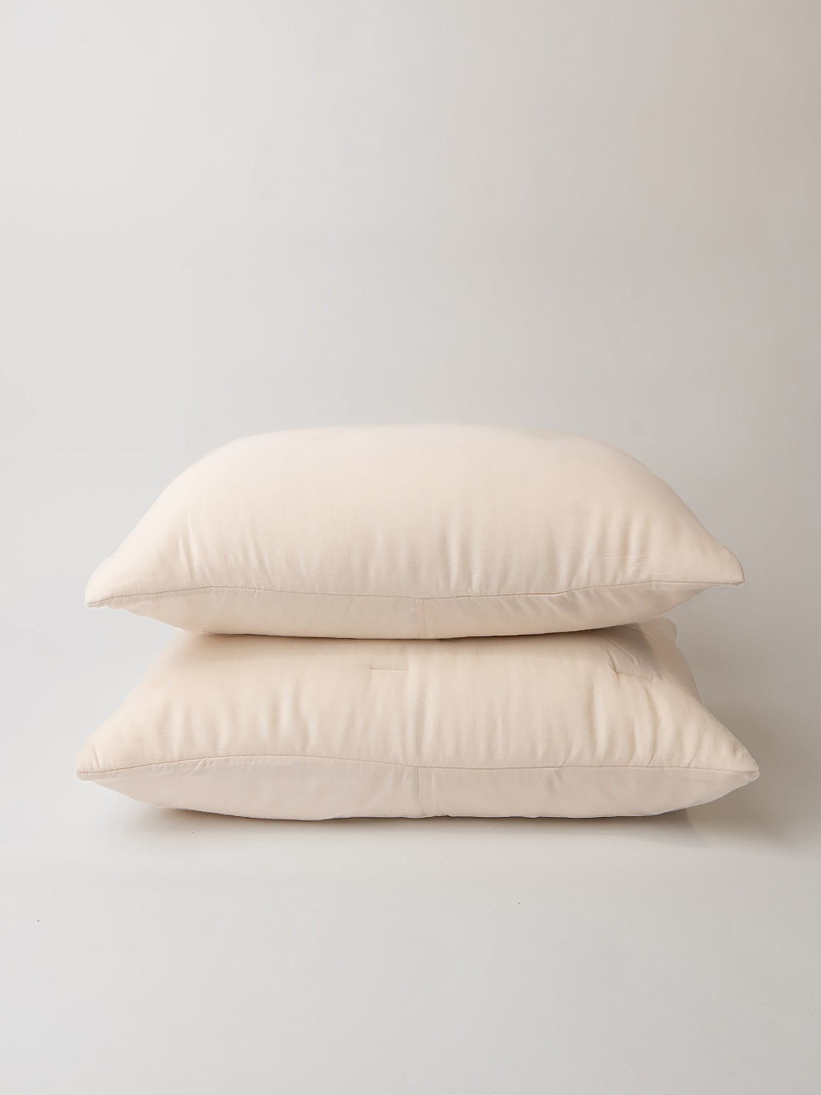 Buttermilk Aire Bamboo Puckered Shams standard size. The sham photographed with a white background