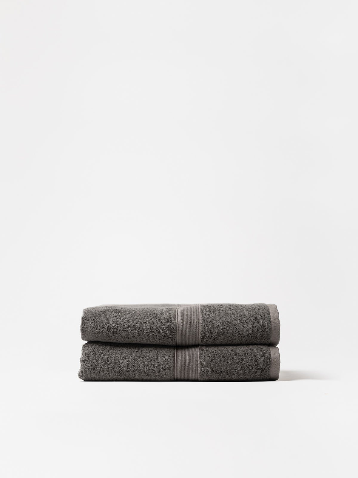 Two luxe bath sheets folded with white background |Color:Charcoal