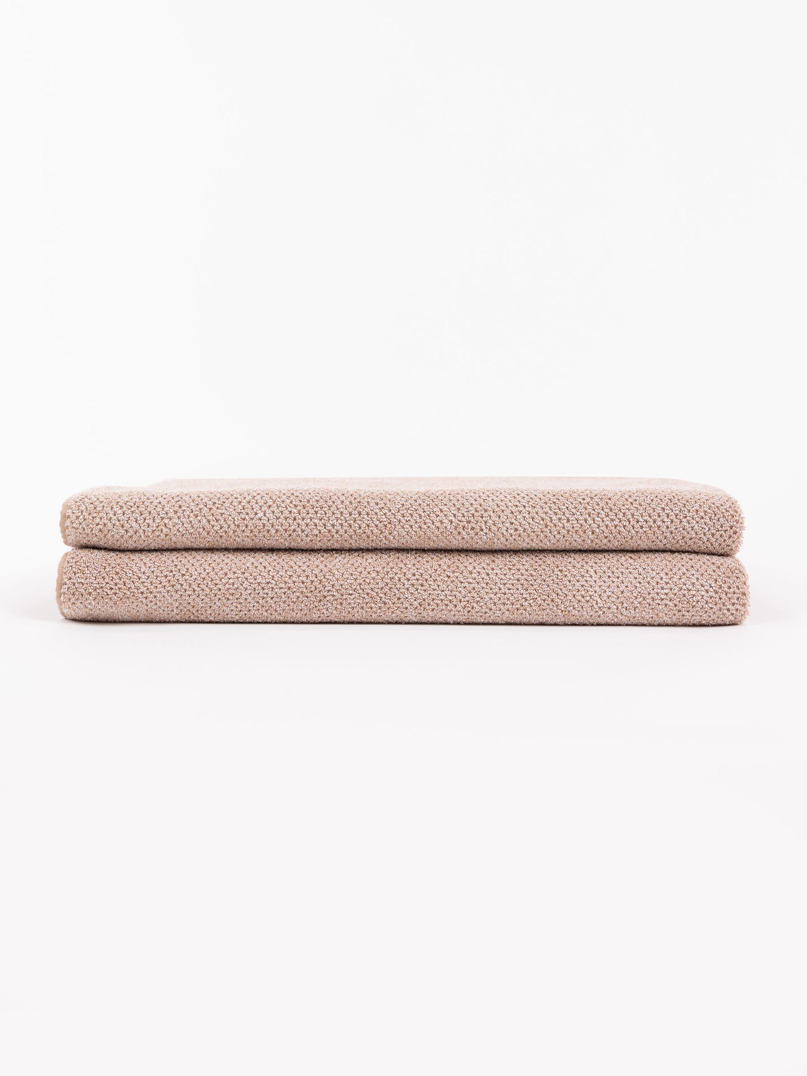 A pair of folded Nantucket Bath Sheets