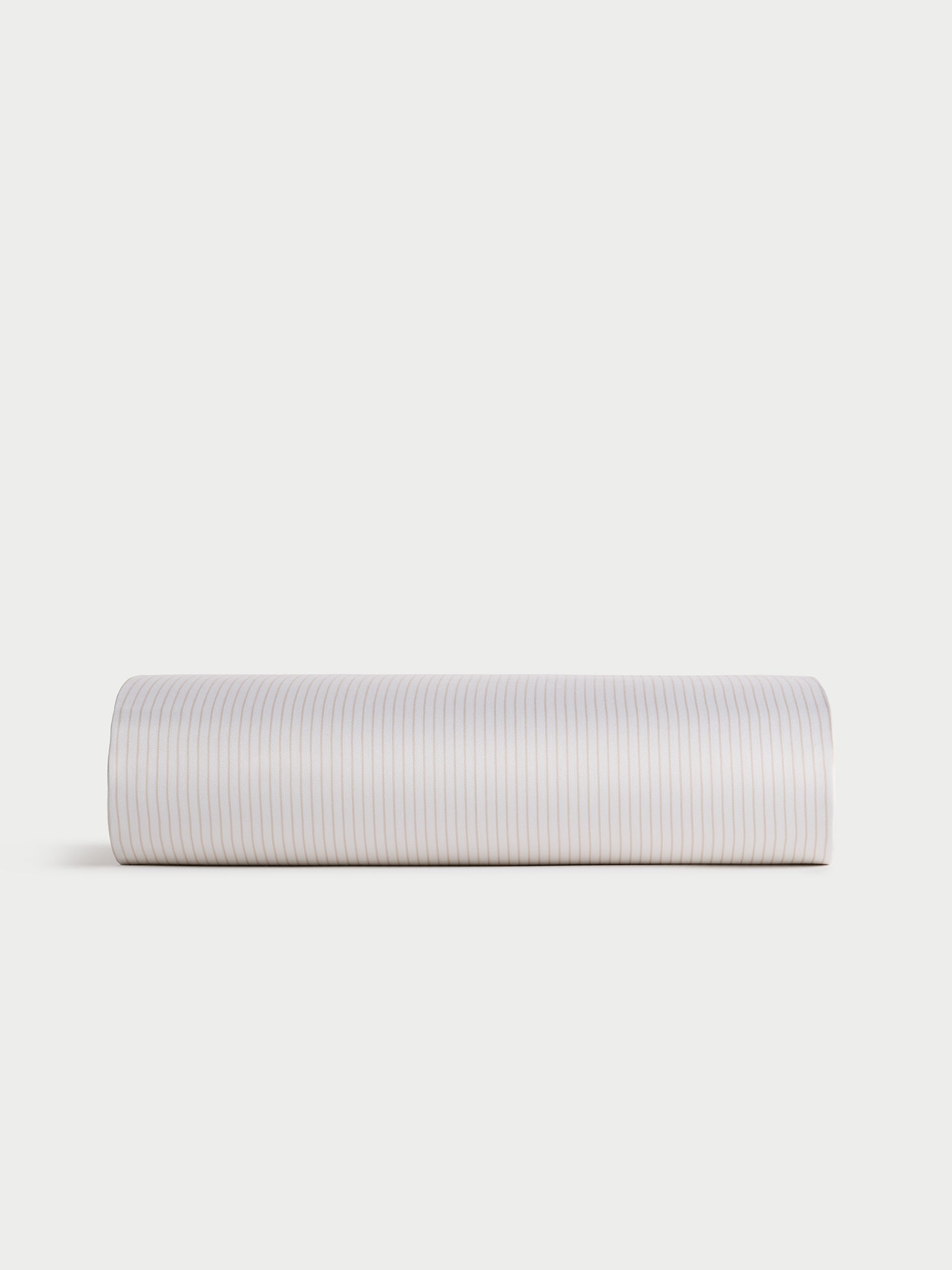 A Bamboo Duvet Cover by Cozy Earth, featuring a subtle striped pattern in shades of white and light beige, displayed against a plain white background.