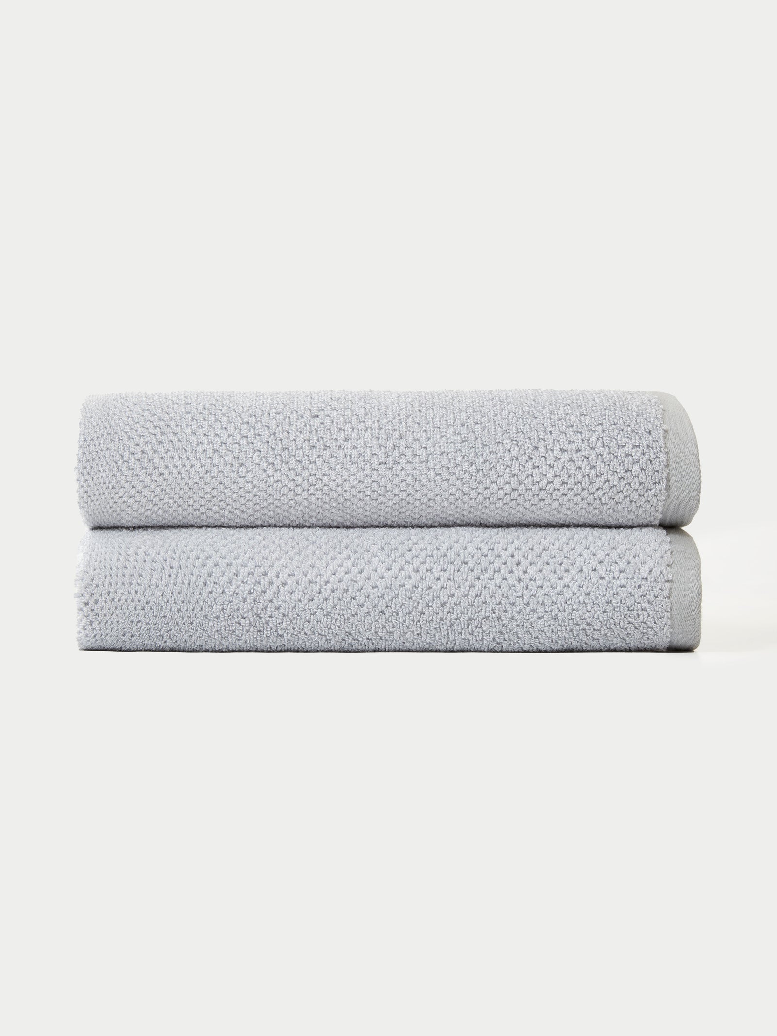 Nantucket Bath Towels in the color Heathered Harbor Mist. Photo of Nantucket Bath Towels taken with the bath towels on a white background. 