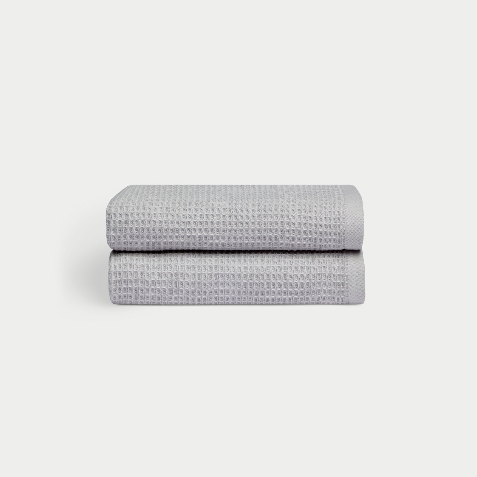 Harbor Mist Waffle Hand Towel set neatly folded. The photo was taken with a white background.