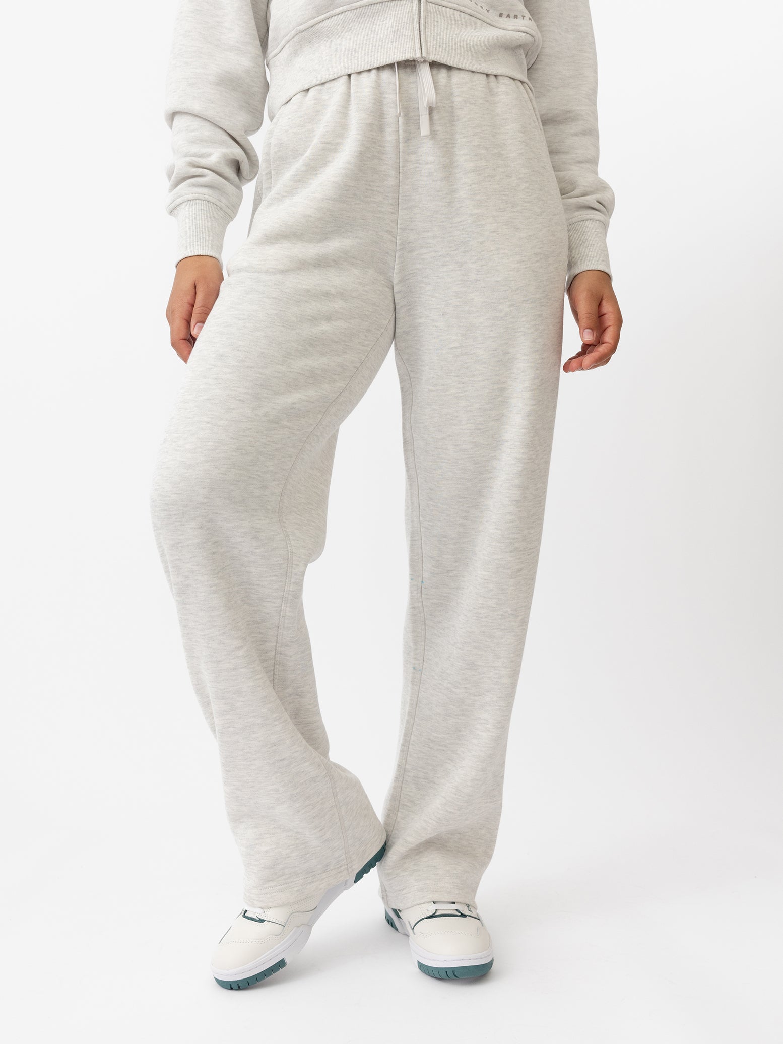 Woman wearing Heather Grey CityScape Wide Leg Pant with white background |Color: Heather Grey