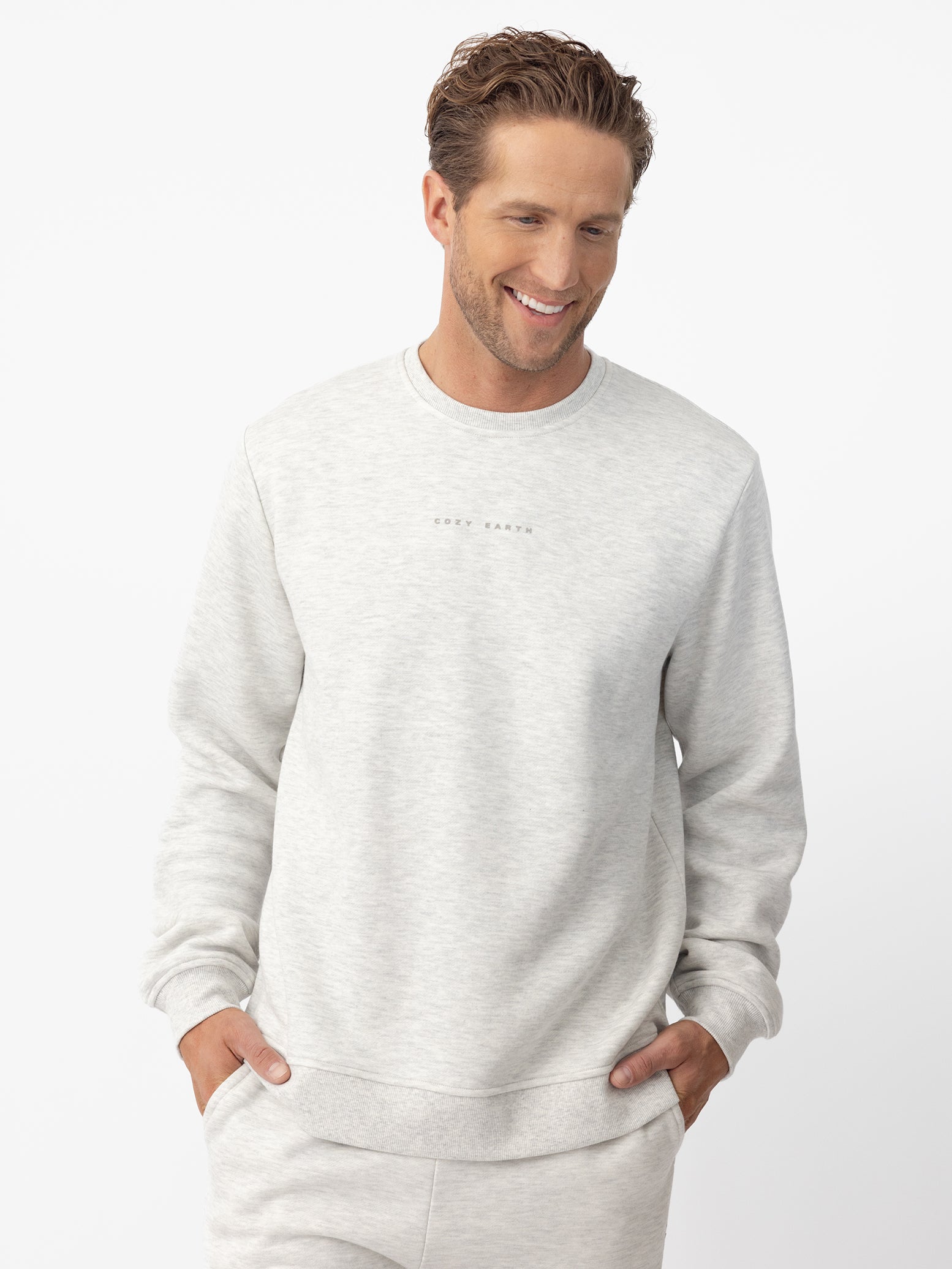 Man wearing heather grey cityscape pullover with white background |Color:Heather Grey