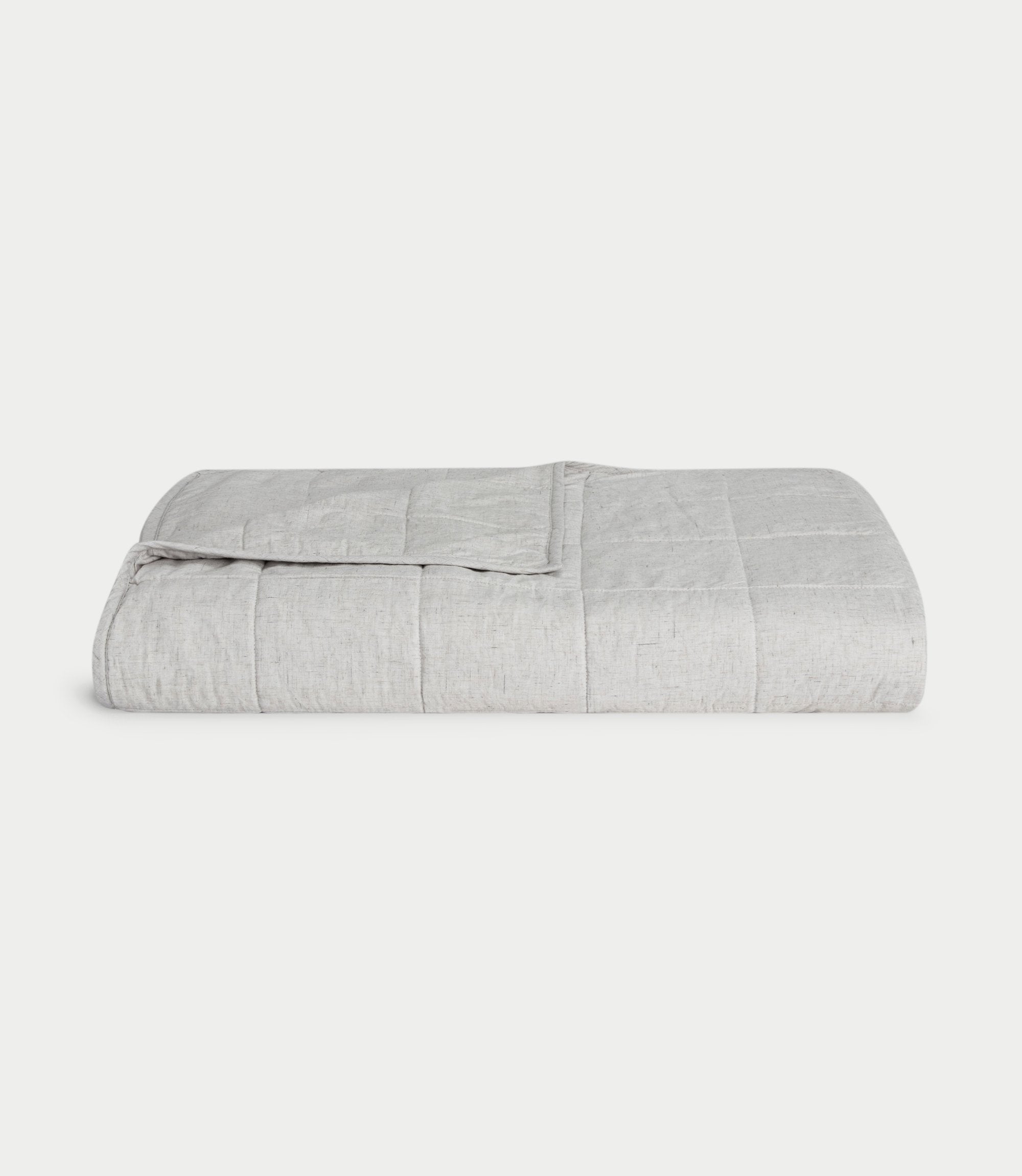 Light Grey Linen Bamboo Box Quilt folded with white background.|Color: Light Grey
