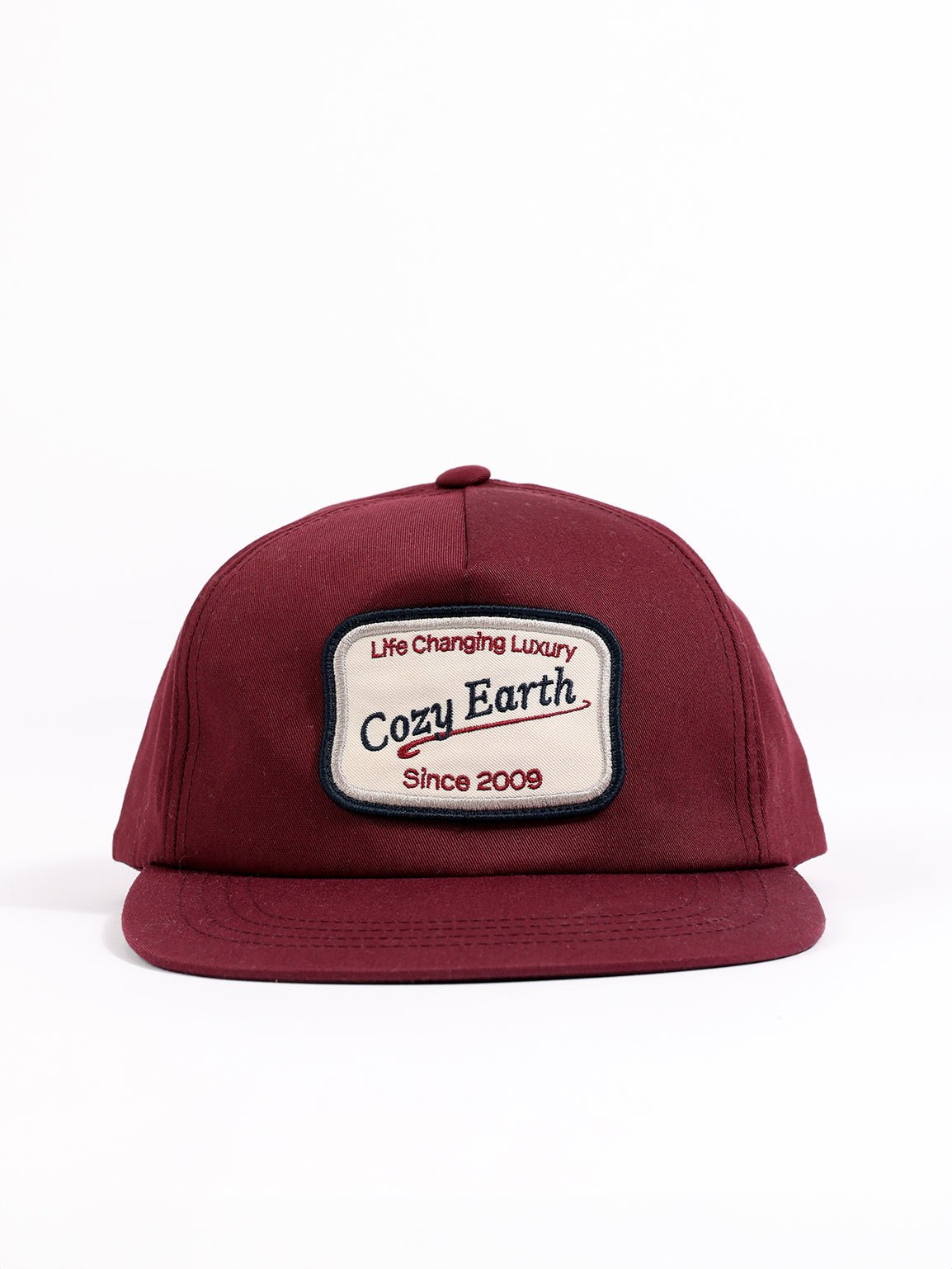 Maroon heritage snapback with white background 