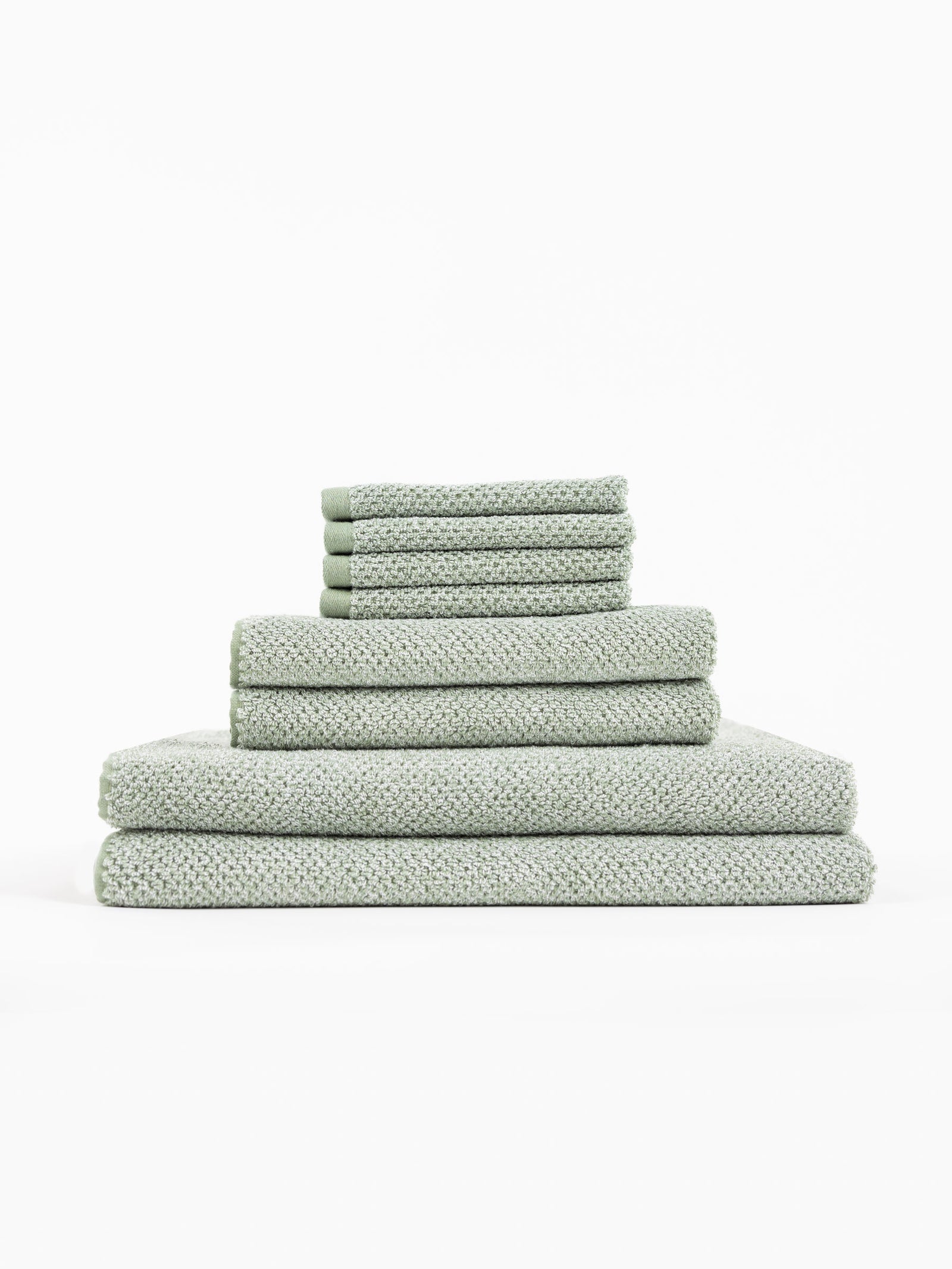 A stack of Nantucket Bath Towels sit in front of a white background.
