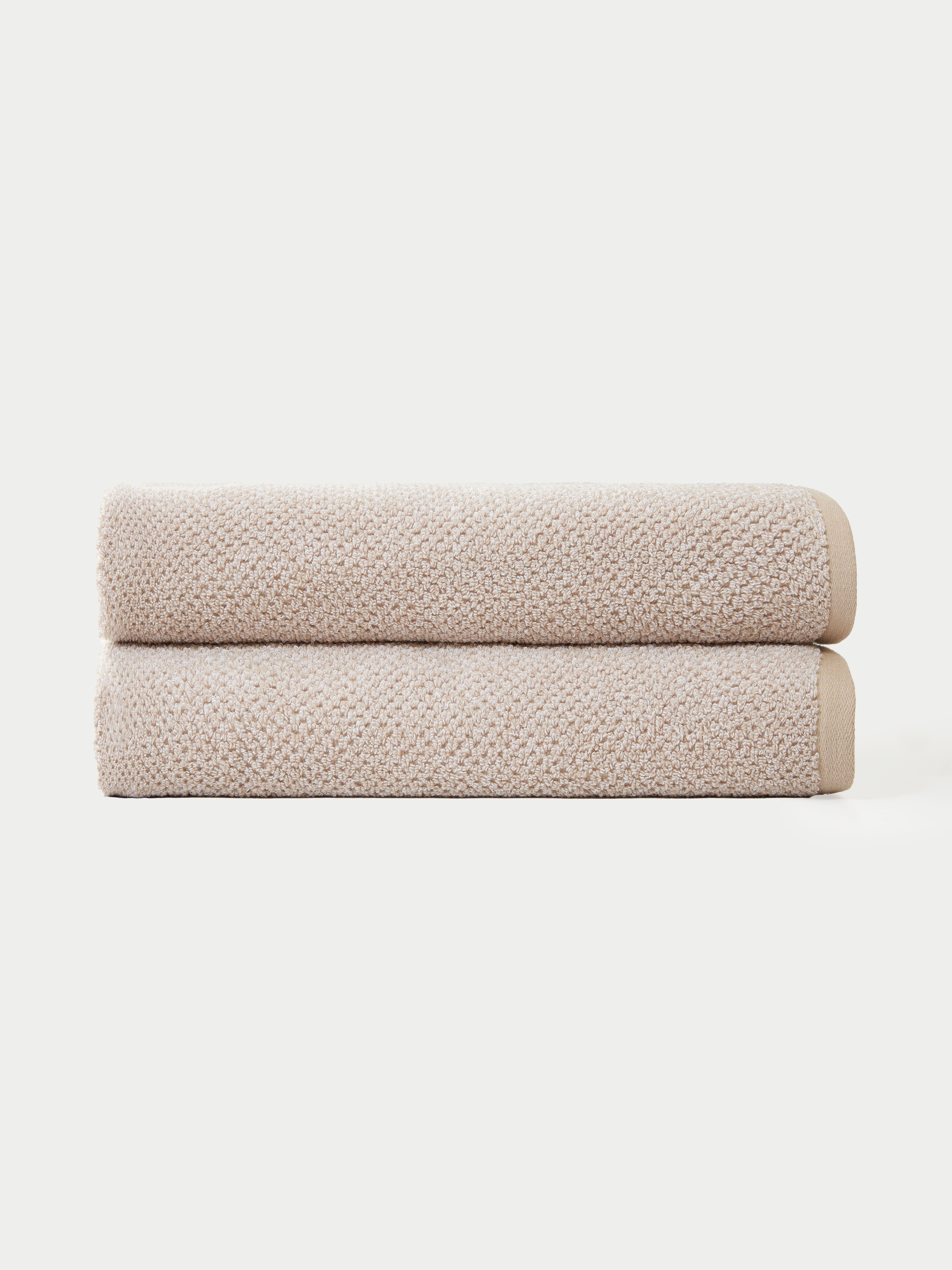 Nantucket Bath Towels in the color Heathered Sand. Photo of Nantucket Bath Towels taken with the bath towels on a white background. |Color: Heathered Sand