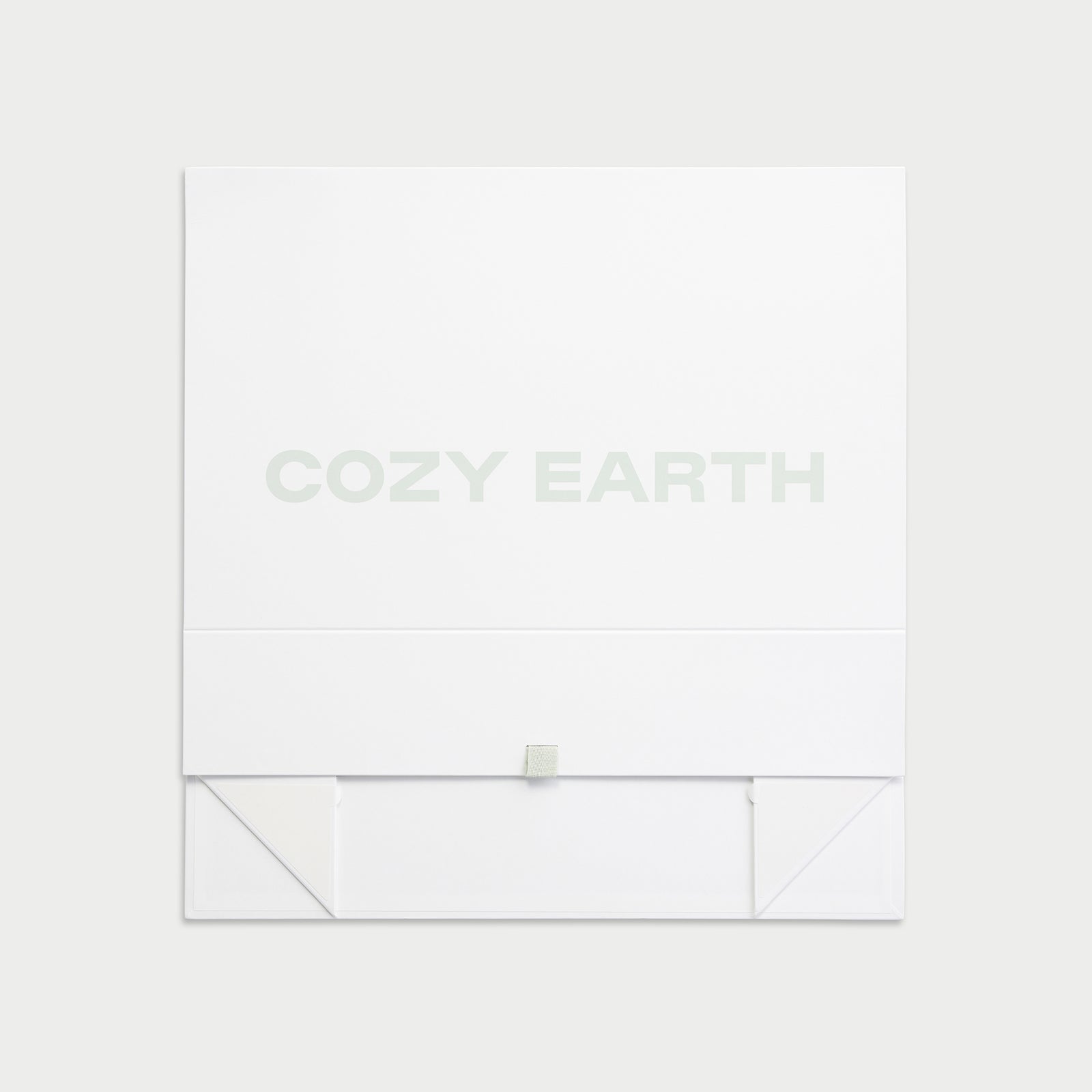 Closed and flattened cozy earth gift box