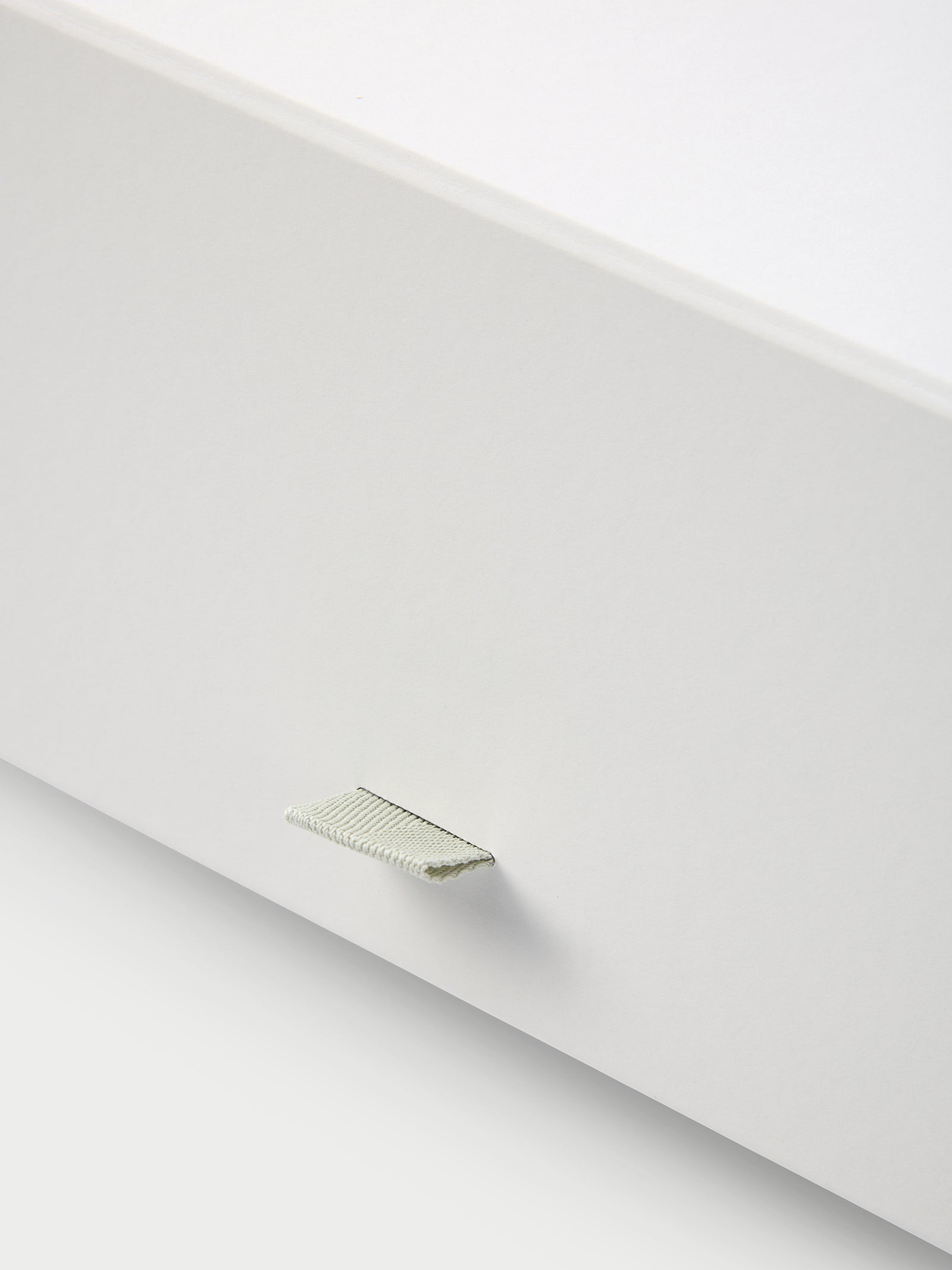 Close up of tab on gift box
