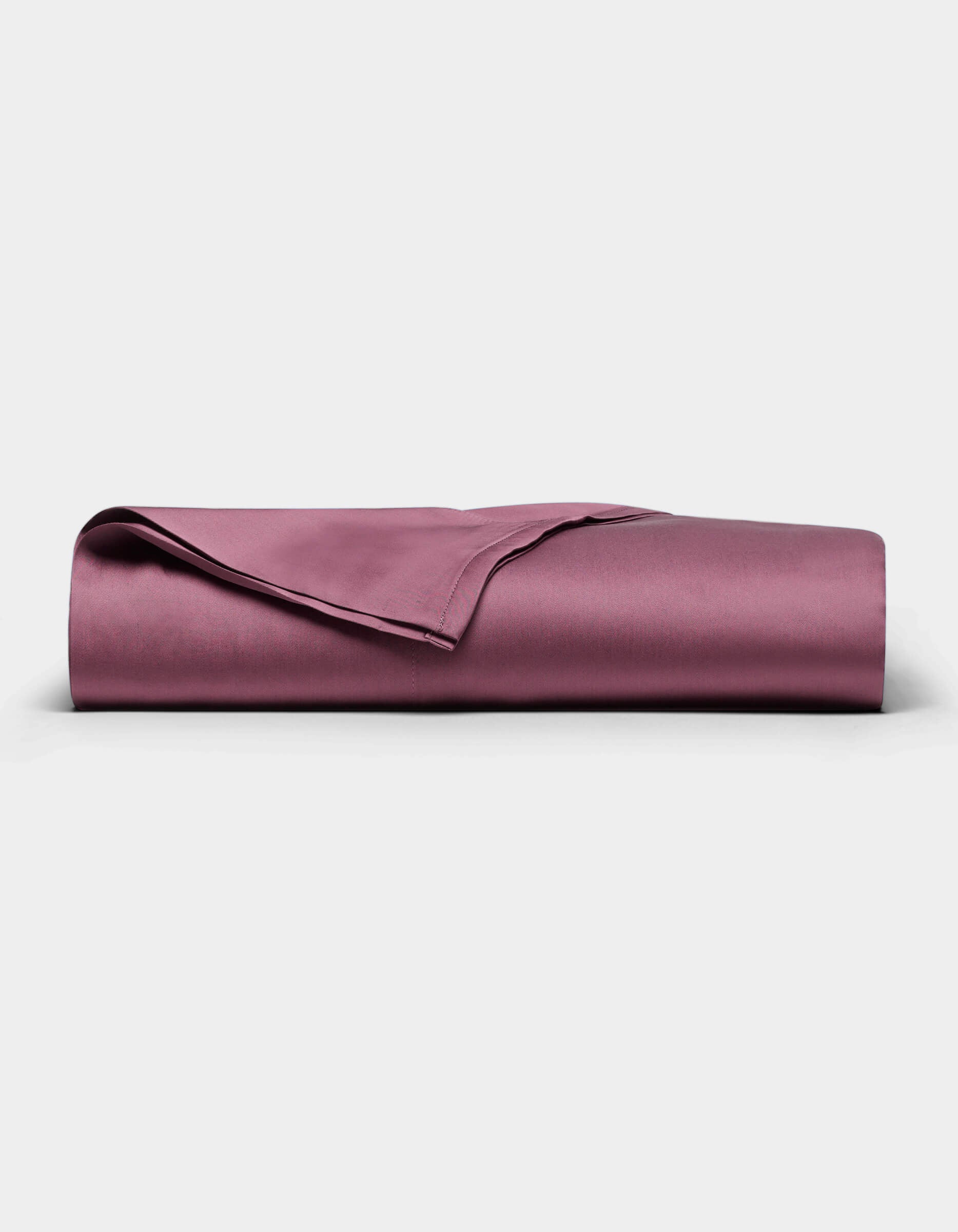 A neatly folded Cozy Earth Bamboo Sheet Set is displayed on a plain white background.|Color:Mulberry