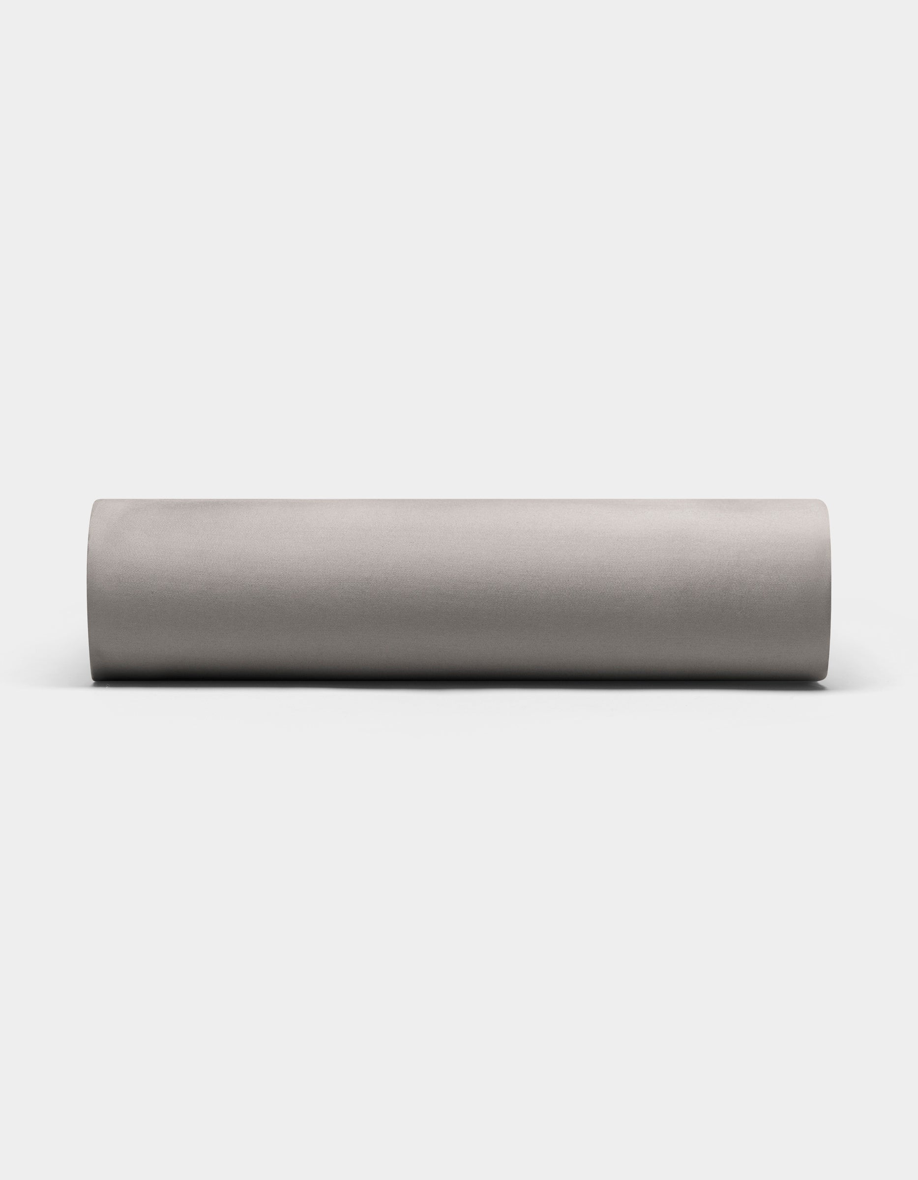 A Bamboo Fitted Sheet by Cozy Earth is displayed horizontally against a plain white background.|Color:Charcoal