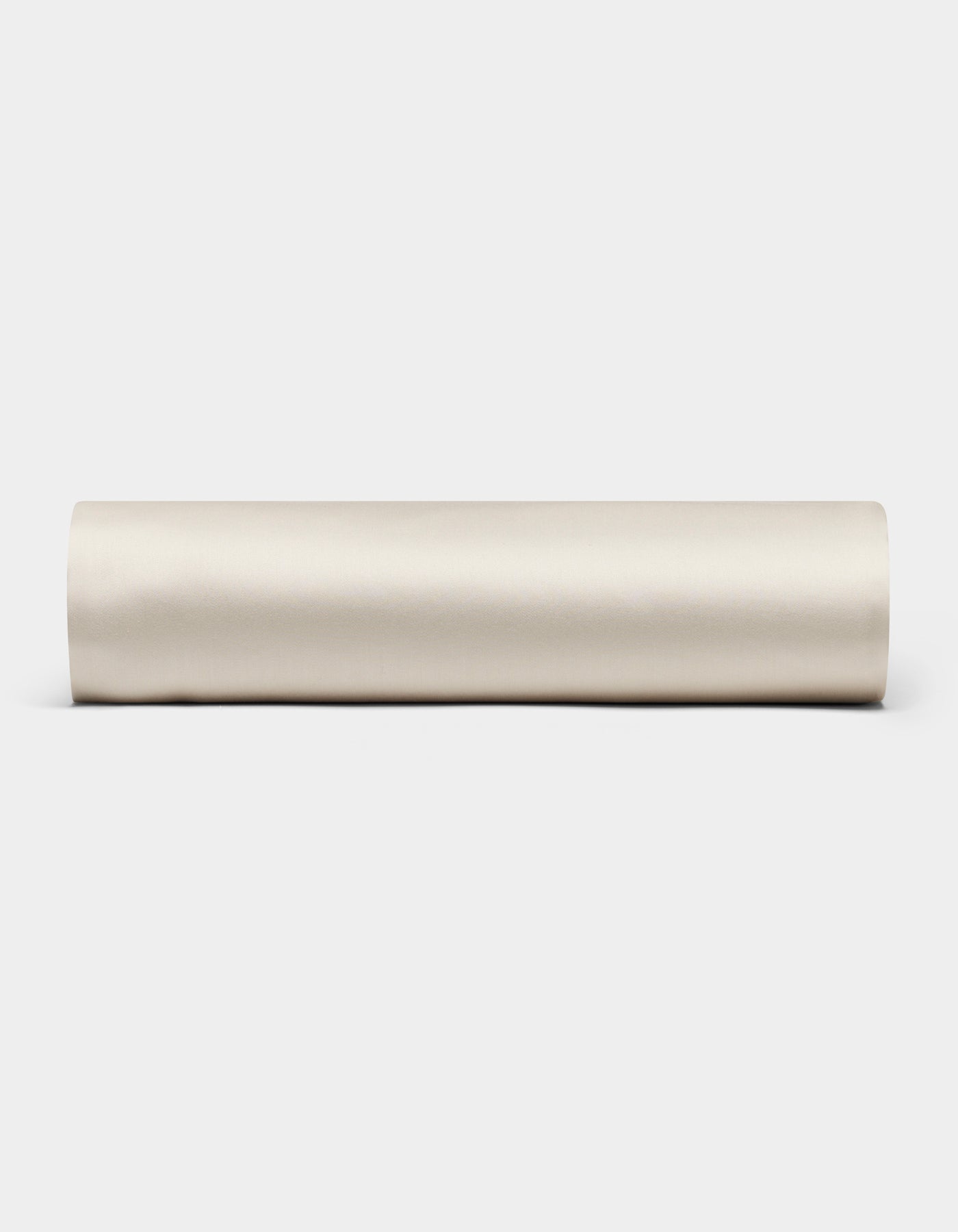 The Cozy Earth Bamboo Fitted Sheet, shown rolled up in beige, is displayed horizontally against a plain white background.|Color:Oat
