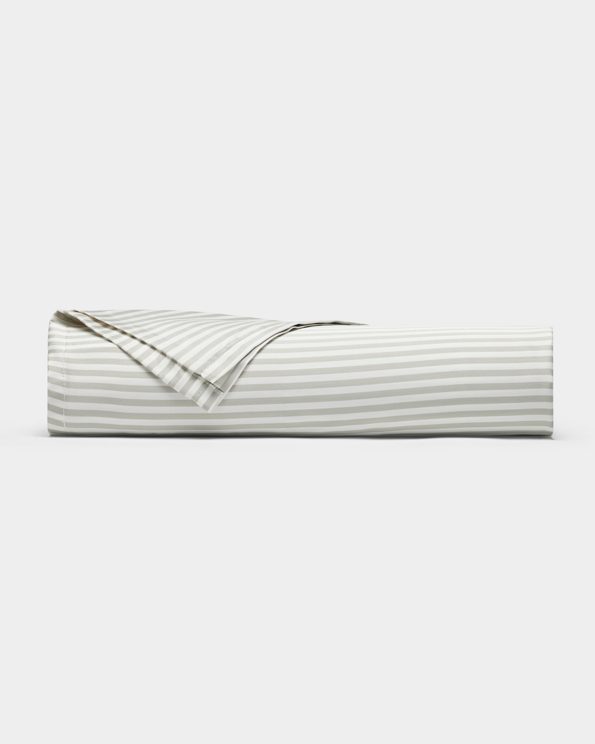 The Cozy Earth Bamboo Sheet Set, featuring light gray and white stripes, is neatly folded and displayed on a plain white background.|Color:Classic Stripe in Laurel