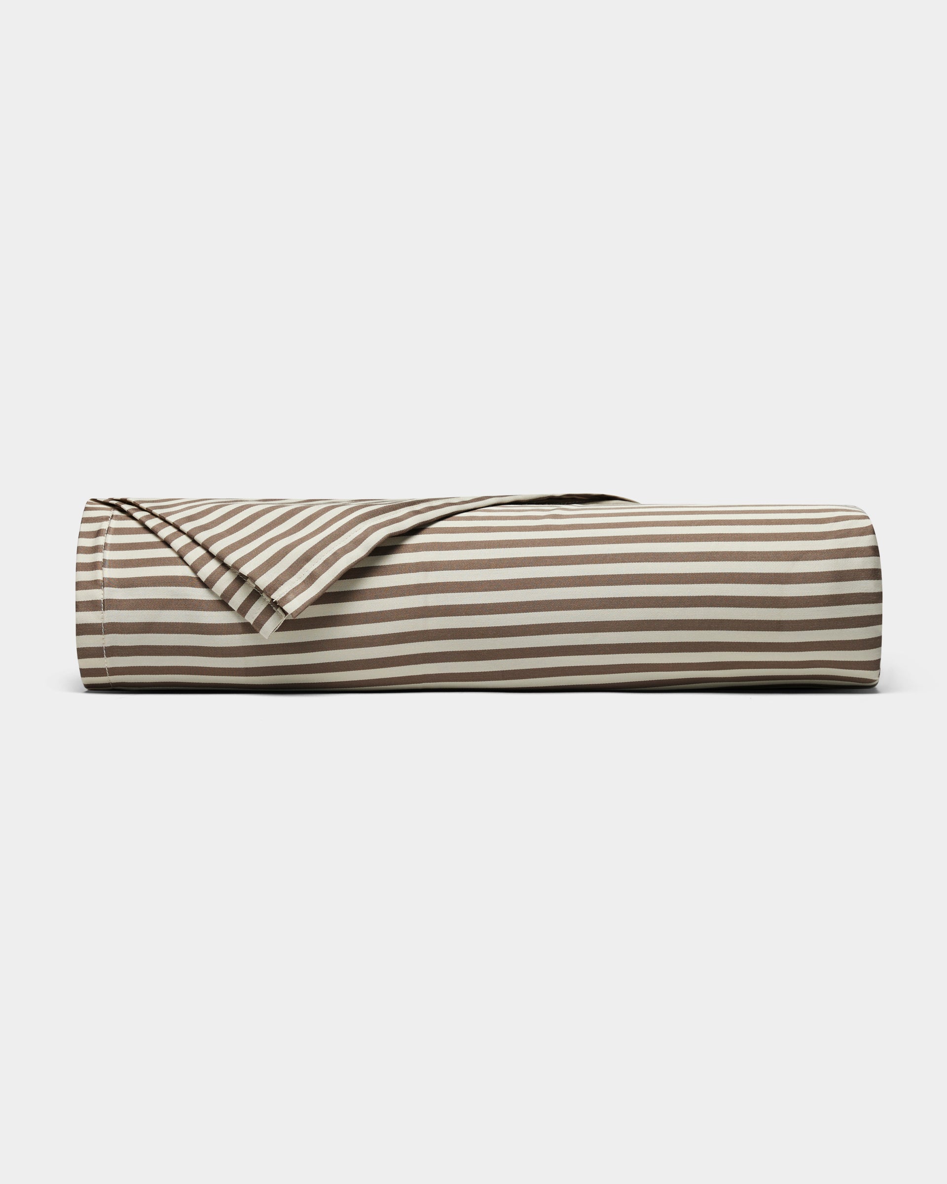 The Cozy Earth Bamboo Sheet Set is shown partially unrolled to reveal its brown and white horizontal stripes, displayed on a plain white background.|Color:Classic Stripe in Ebony