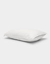 The Cozy Earth Bamboo Jersey Quilted Sham is a white, rectangular pillow cover with a quilted pattern, displayed against a light background. It looks plush with a gentle indentation in the center.|Color:White