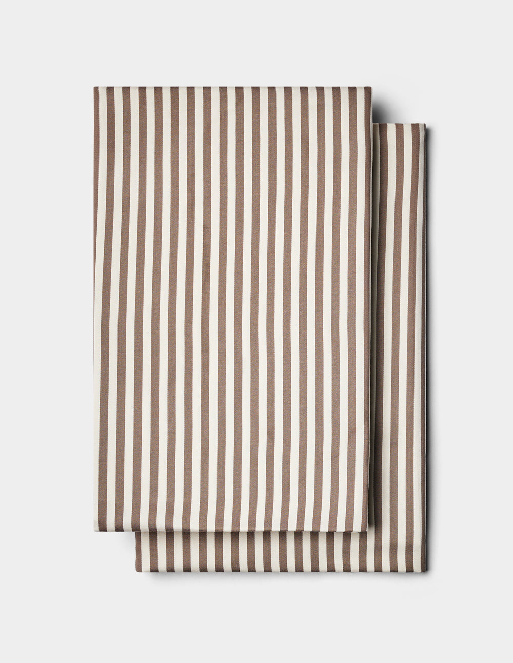 Two folded Cozy Earth Bamboo Pillowcases with vertical brown and white stripes, stacked on a plain white background.|Color:Classic Stripe in Ebony