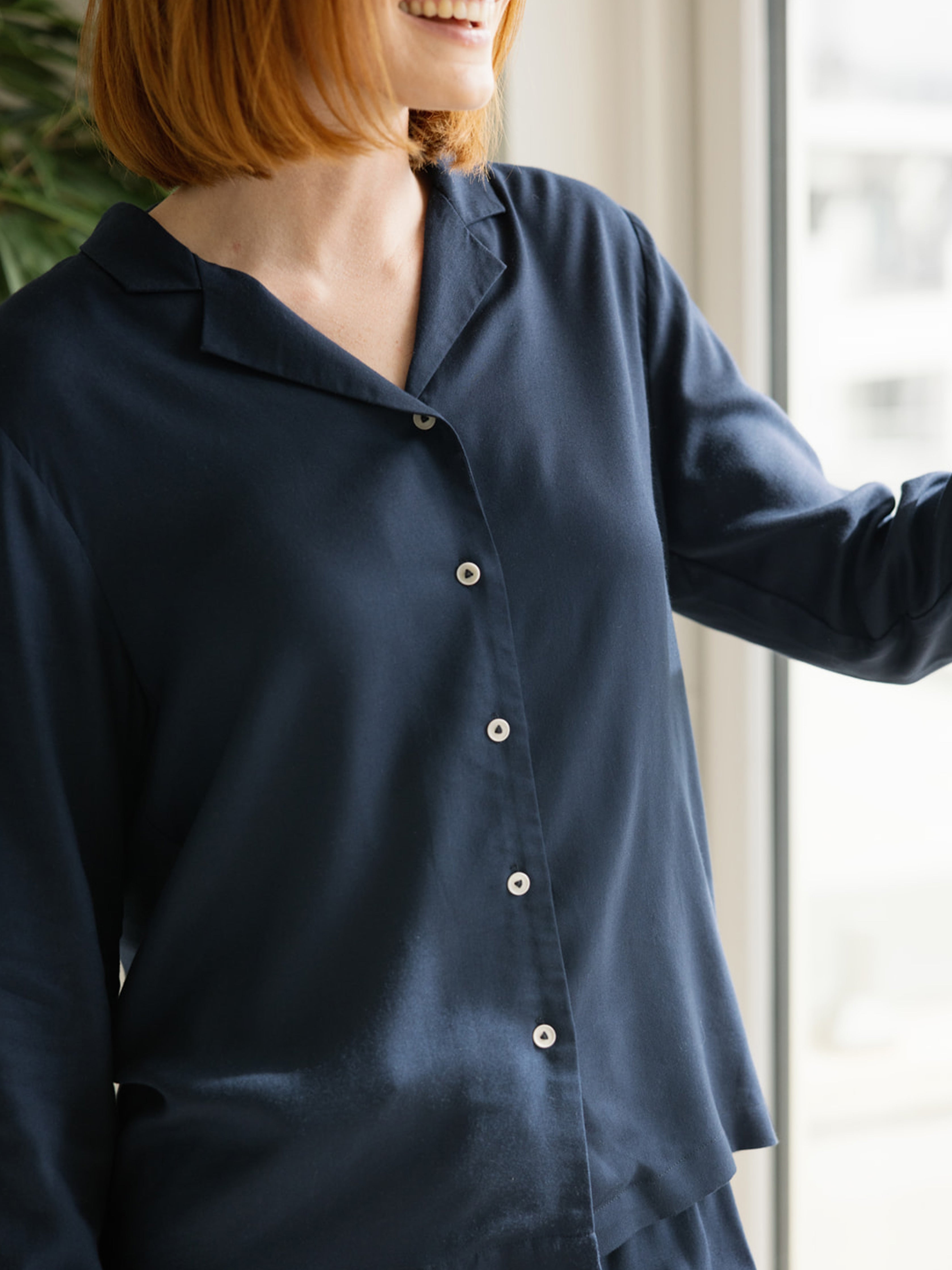 Close up of woman wearing eclipse soft woven pajama top |Color:Eclipse