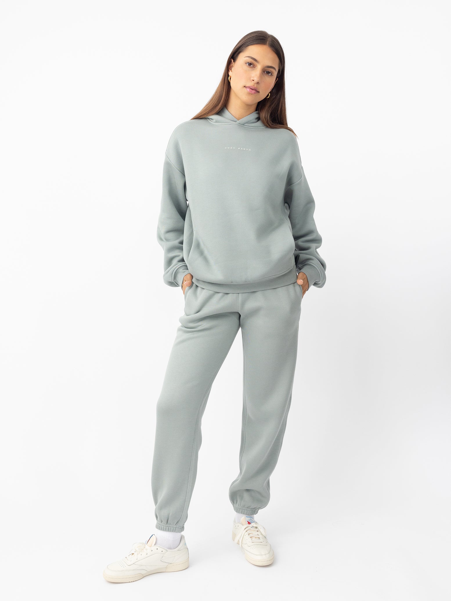Woman in haze cityscape hoodie set with white background
