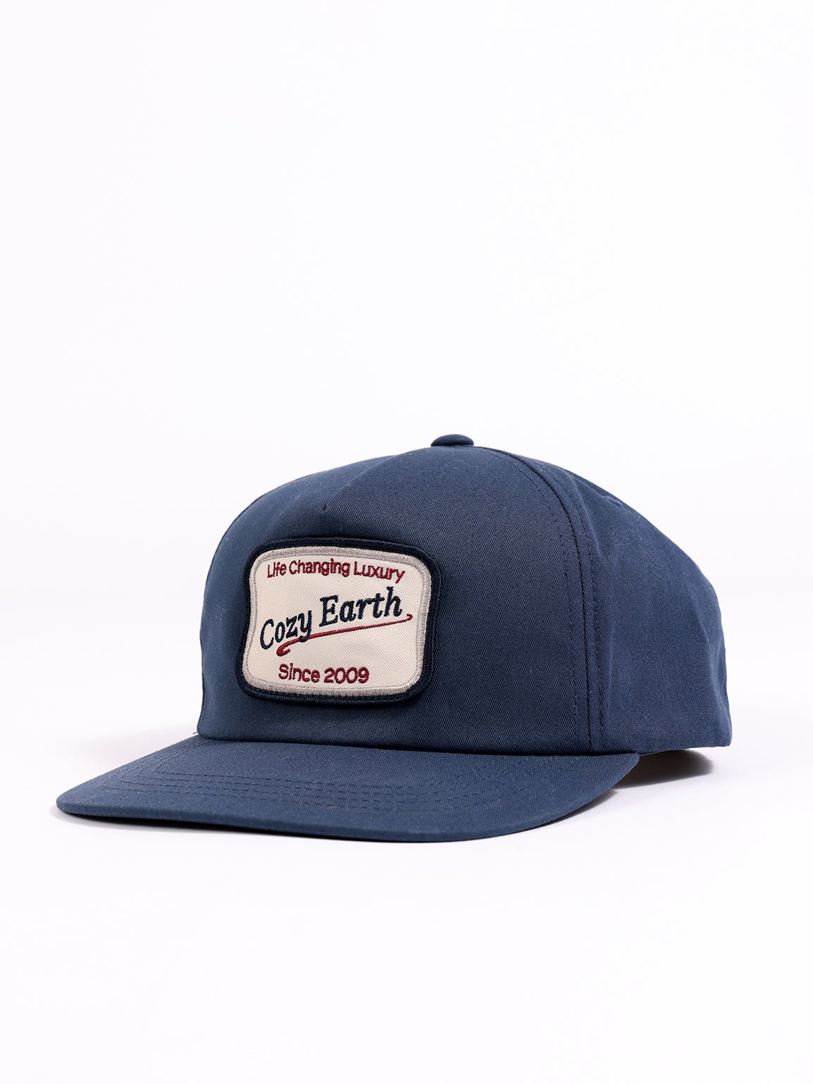 Front and side of navy heritage snapback with white background 