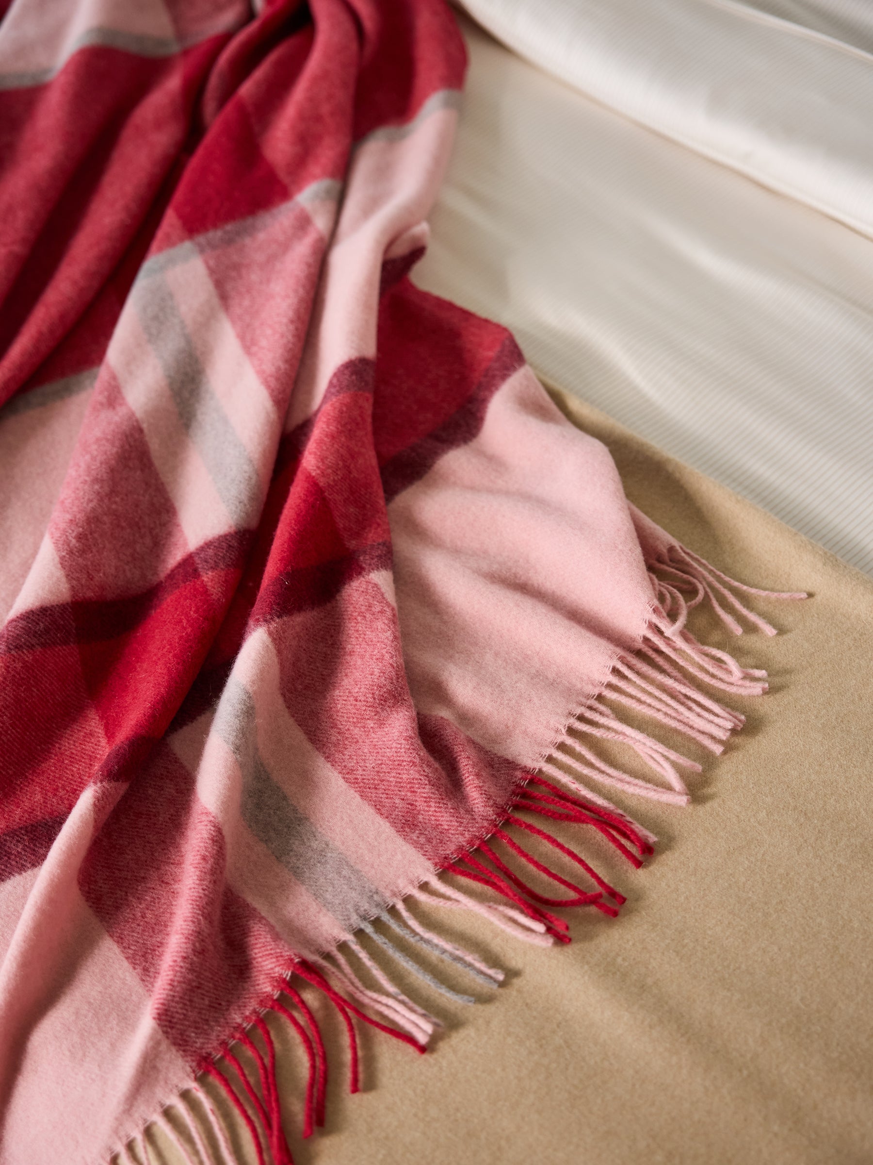 Pink lucca throw laying on bed |Color:Pink