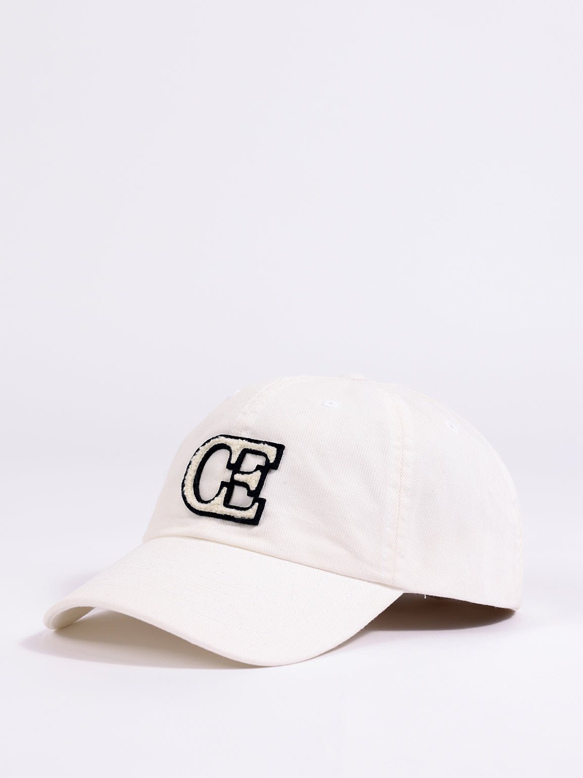 Side view of washed cream vintage cap 