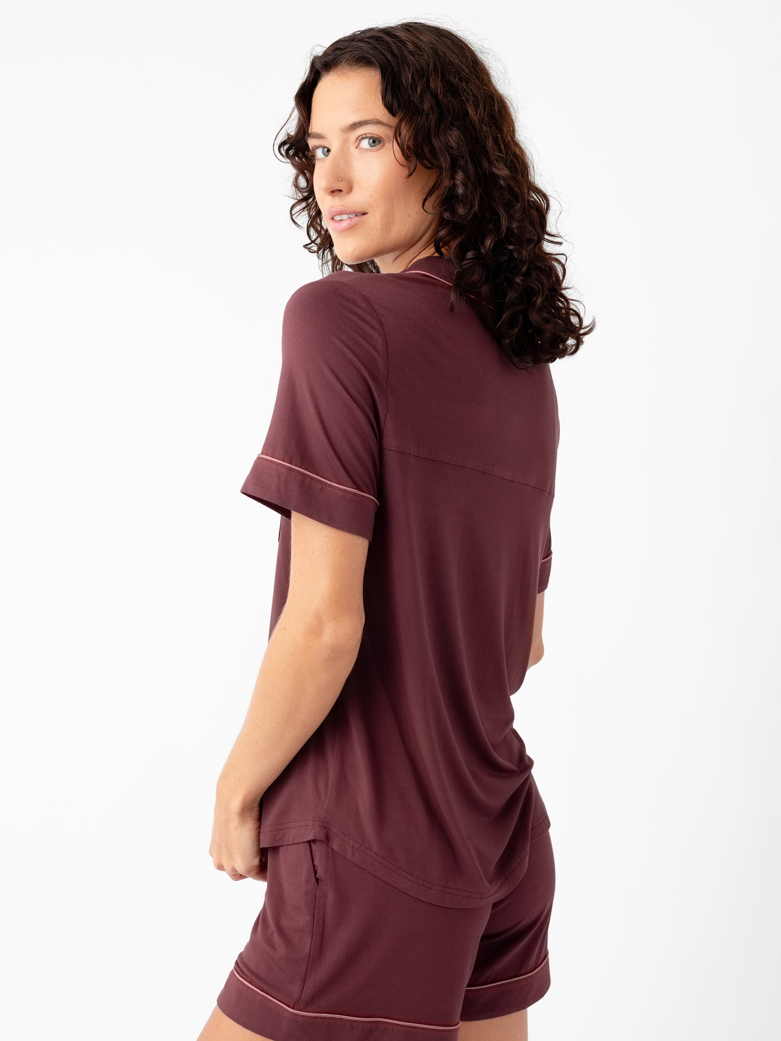 Woman wearing Women's Short Sleeve Bamboo Pajama Top in Stretch-Knit - Burgundy