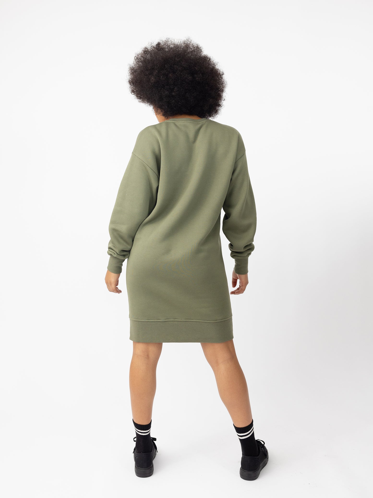 Woman wearing Juniper CityScape Crewneck Dress with white background