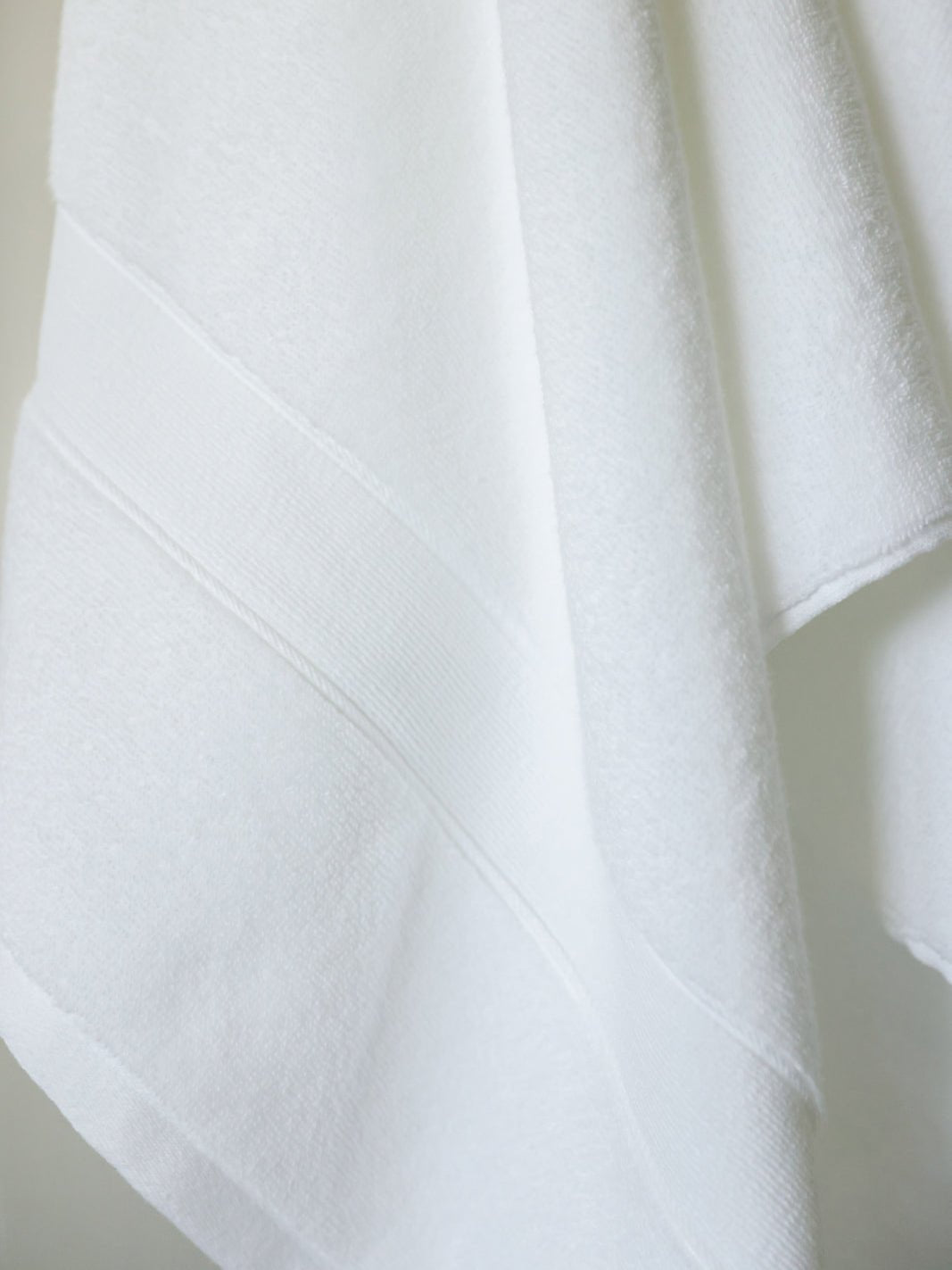 Close up of white luxe bath towel 
