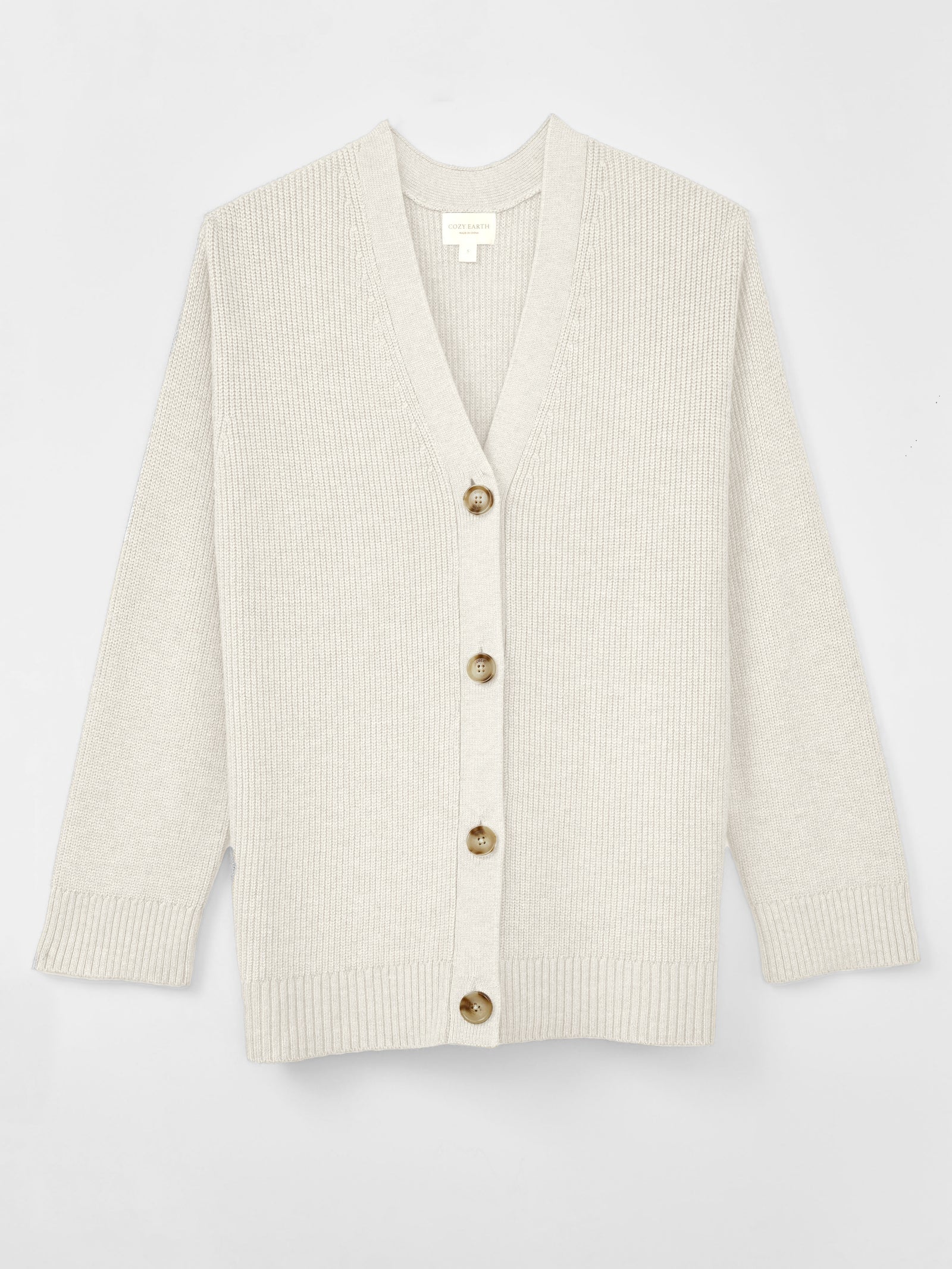 A woman wearing Cozy Earth Classic Cardigan is pictured on a white background