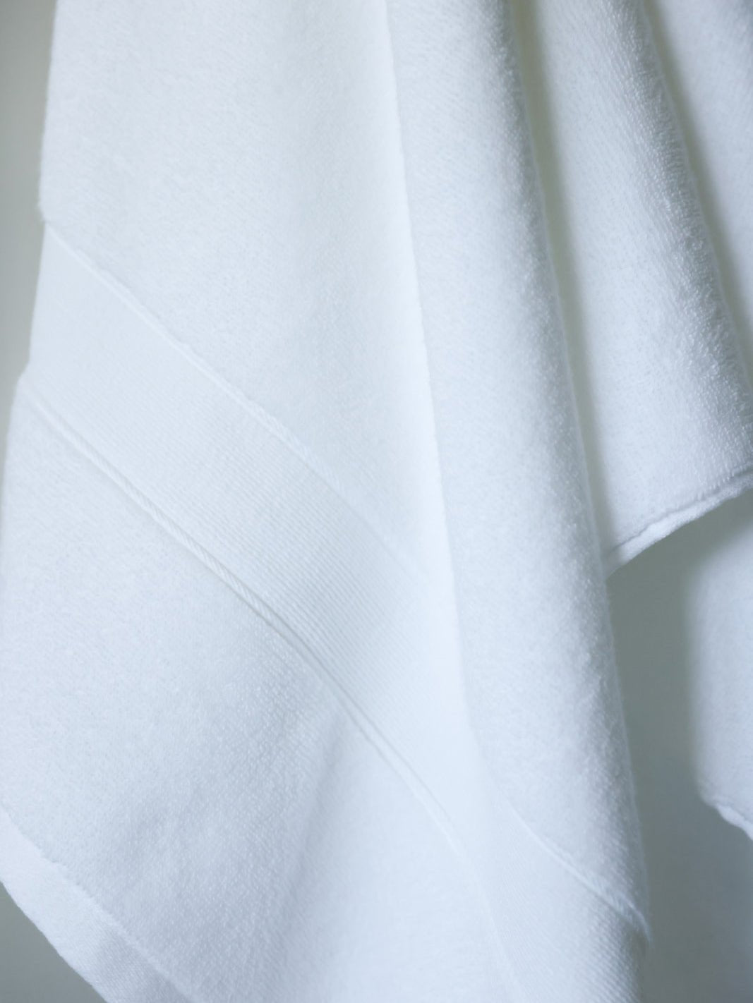 Close up of white luxe bath towel 