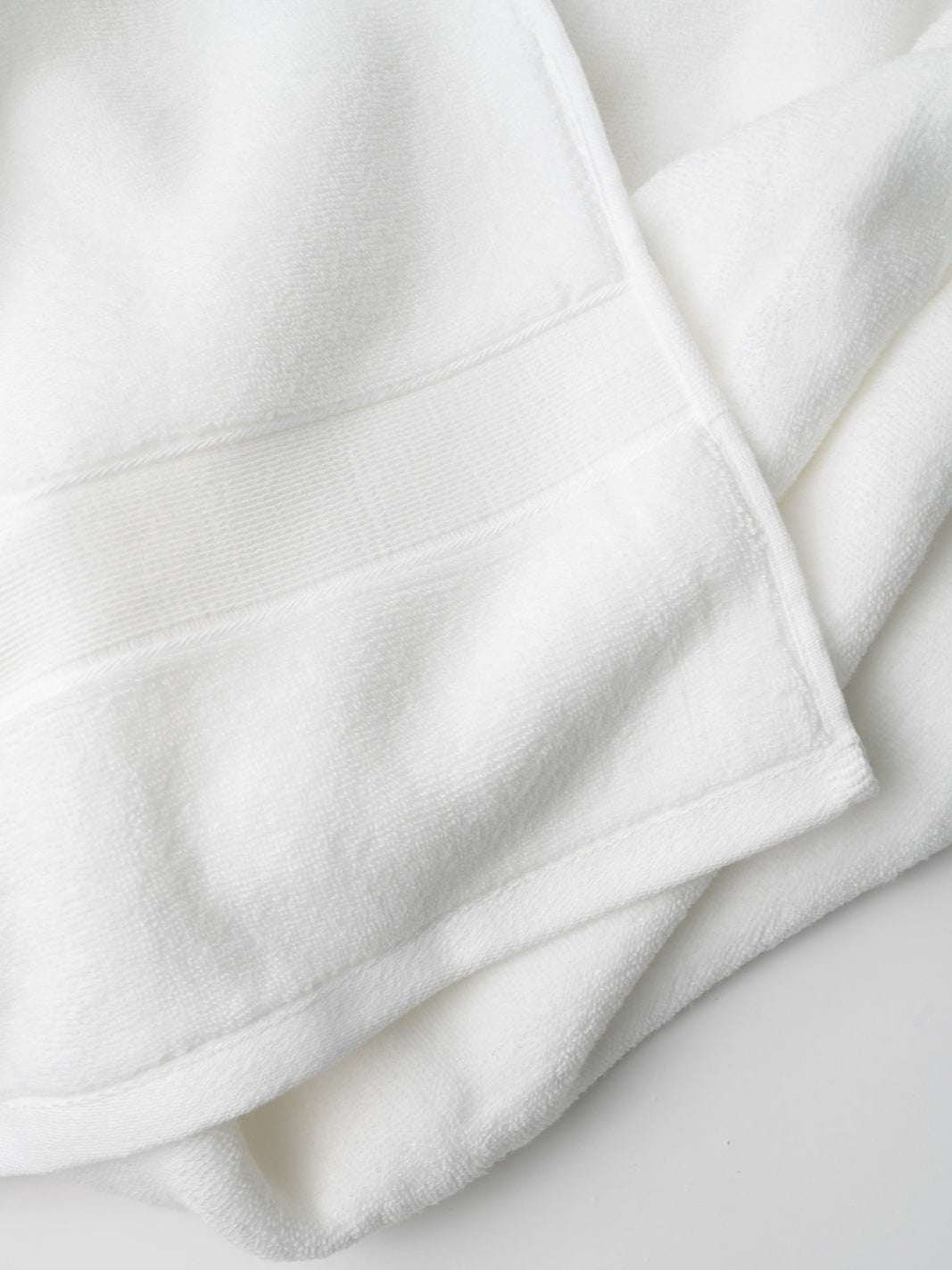 Close up of white luxe bath towel 