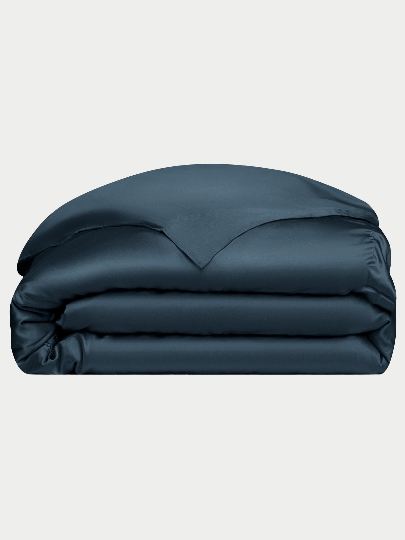 Navy duvet cover folded with white background