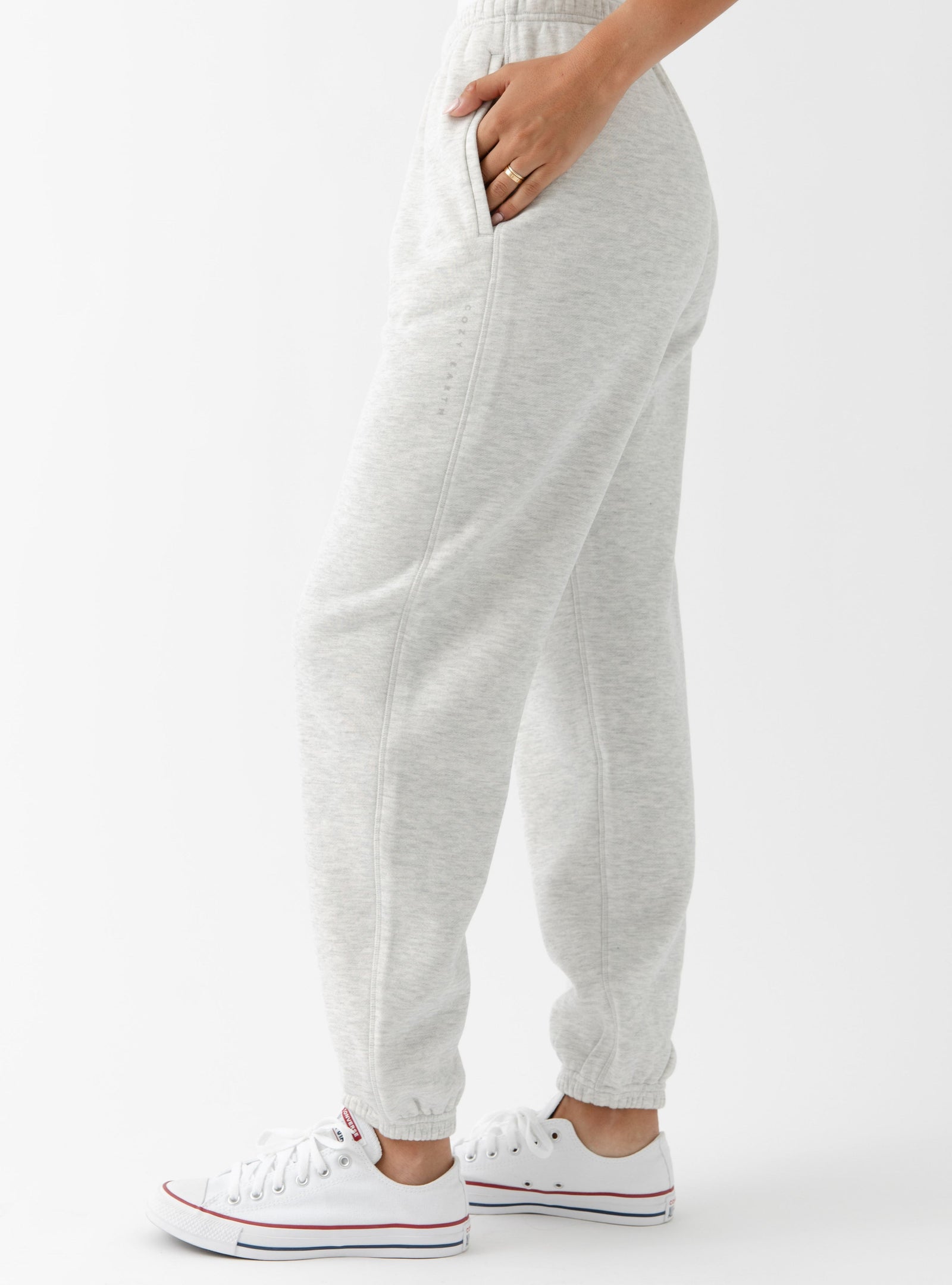 Side view of heather grey cityscape sweats with white background