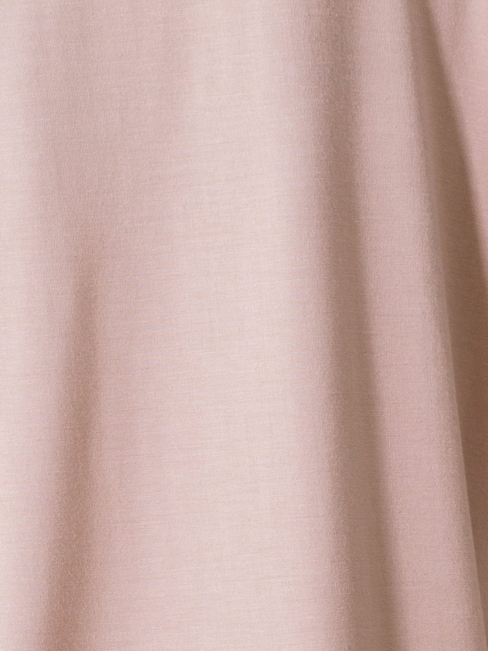 Blush Short Sleeve Pajama Set. The photo was taken close up, showing off the print of the pajamas.