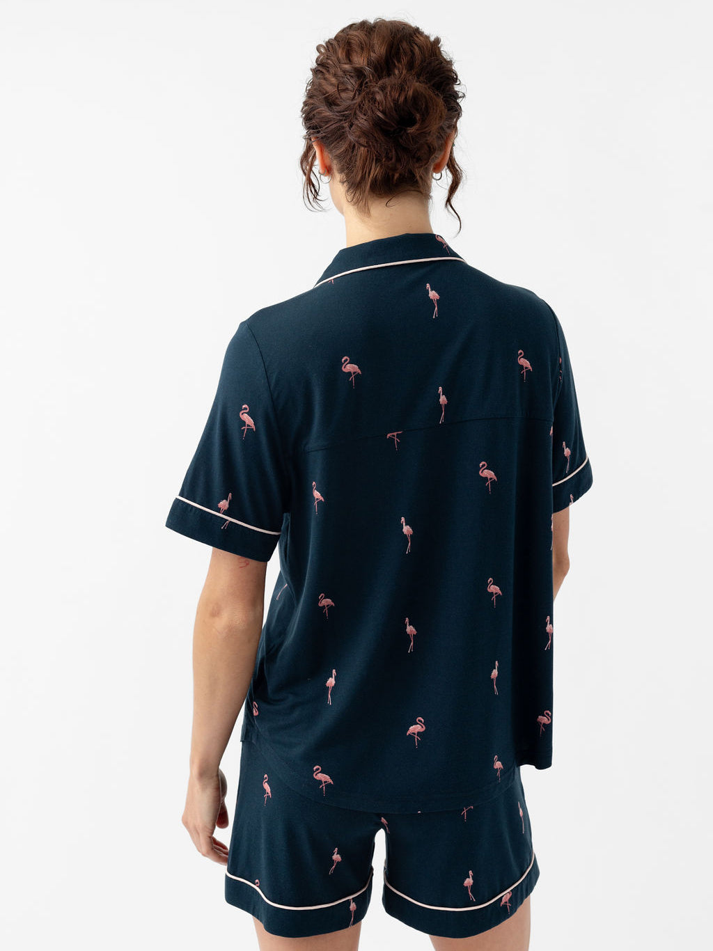 Back of woman in short sleeve flamingo print pajama set 