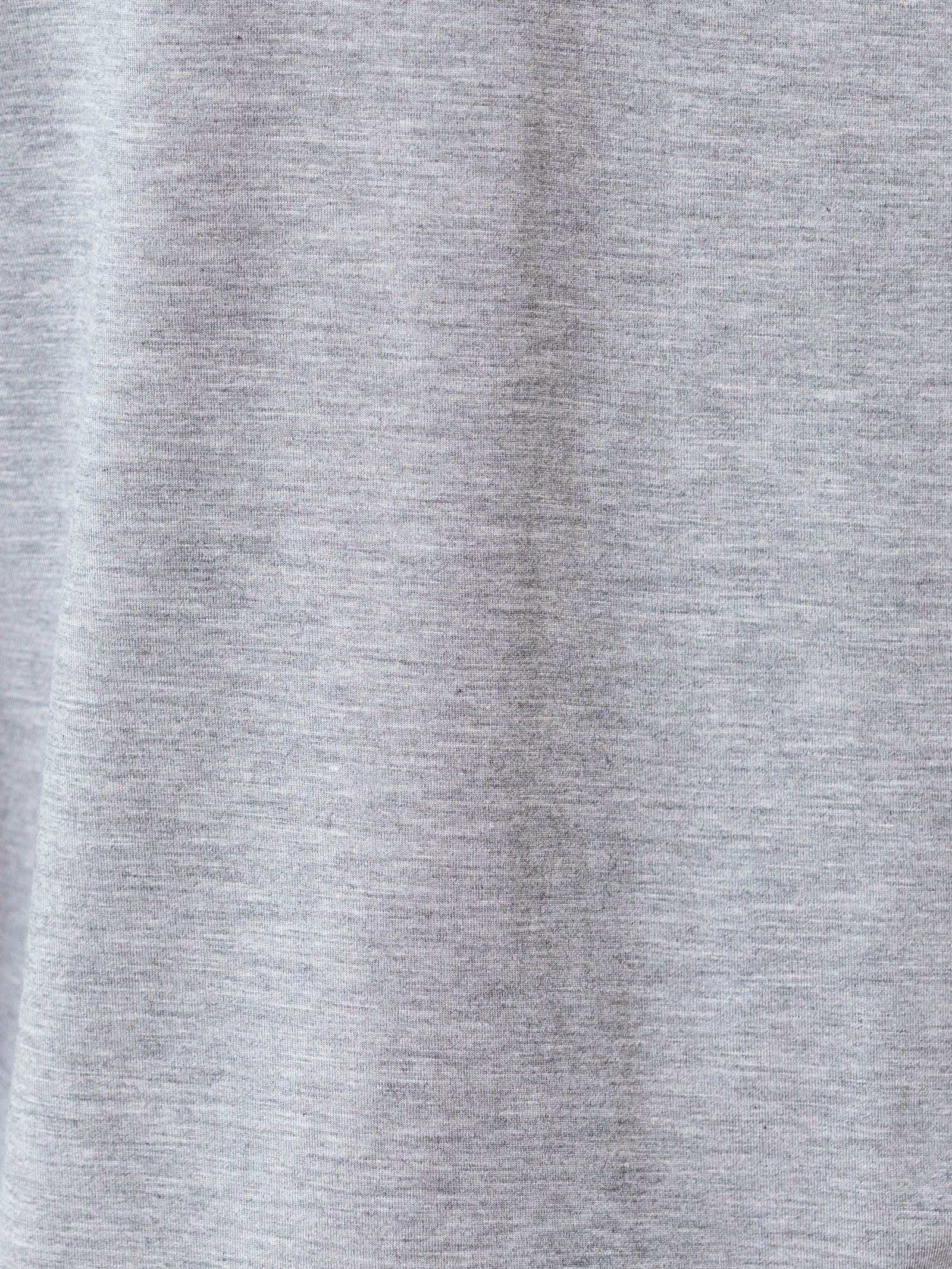 Grey Short Sleeve Pajama Set. The photo was taken close up, showing off the print of the pajamas.