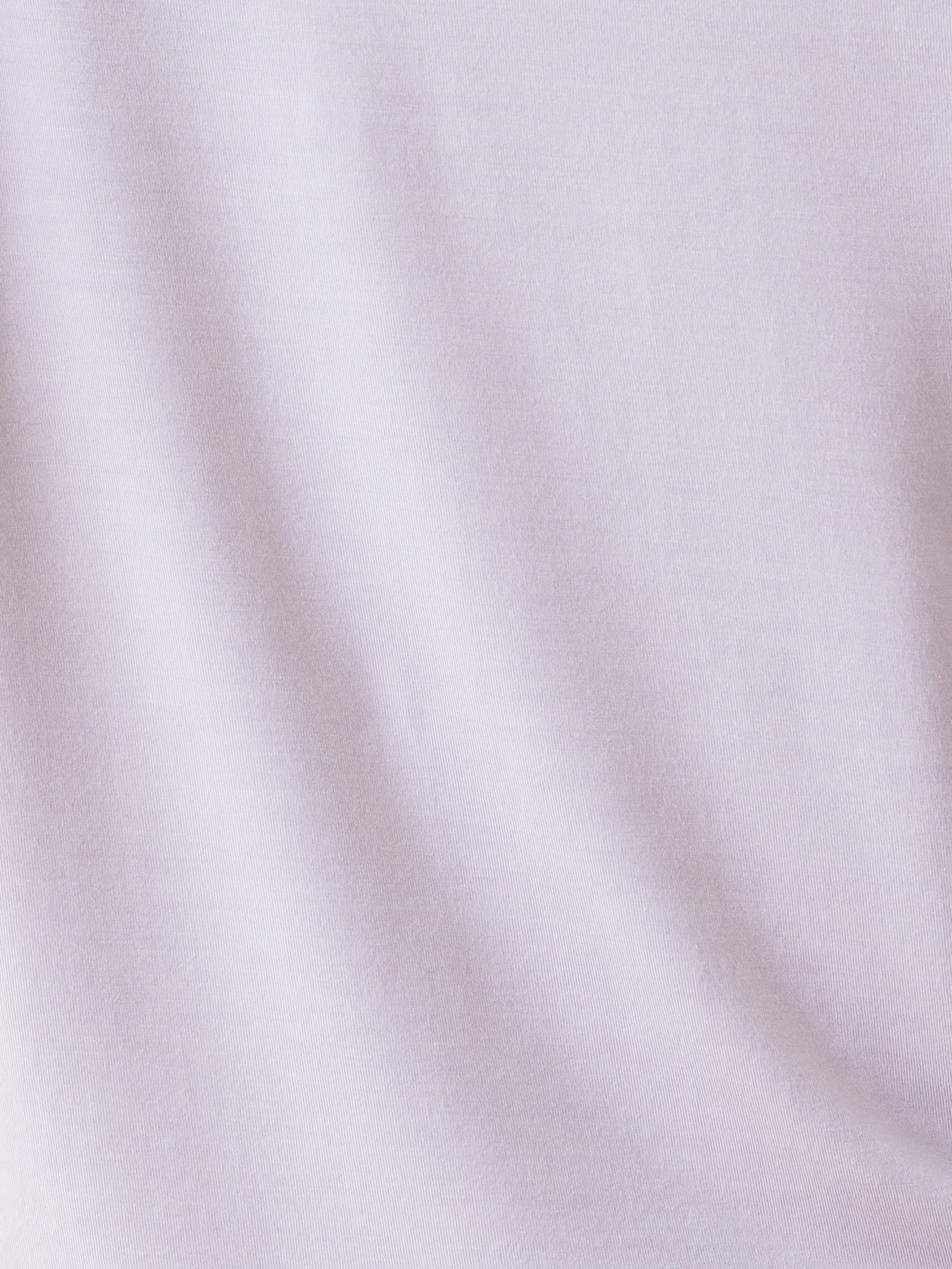 Lilac Short Sleeve Pajama Set. The photo was taken close up, showing off the print of the pajamas.