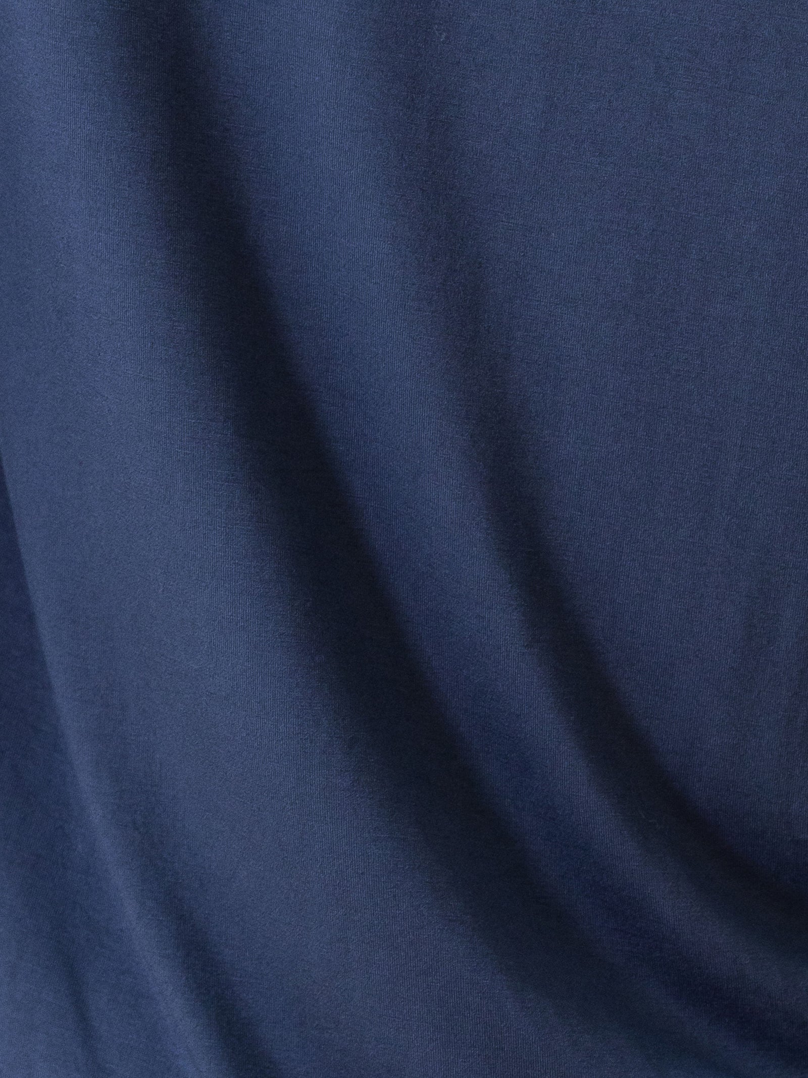 Navy Short Sleeve Pajama Set. The photo was taken close up, showing off the print of the pajamas.