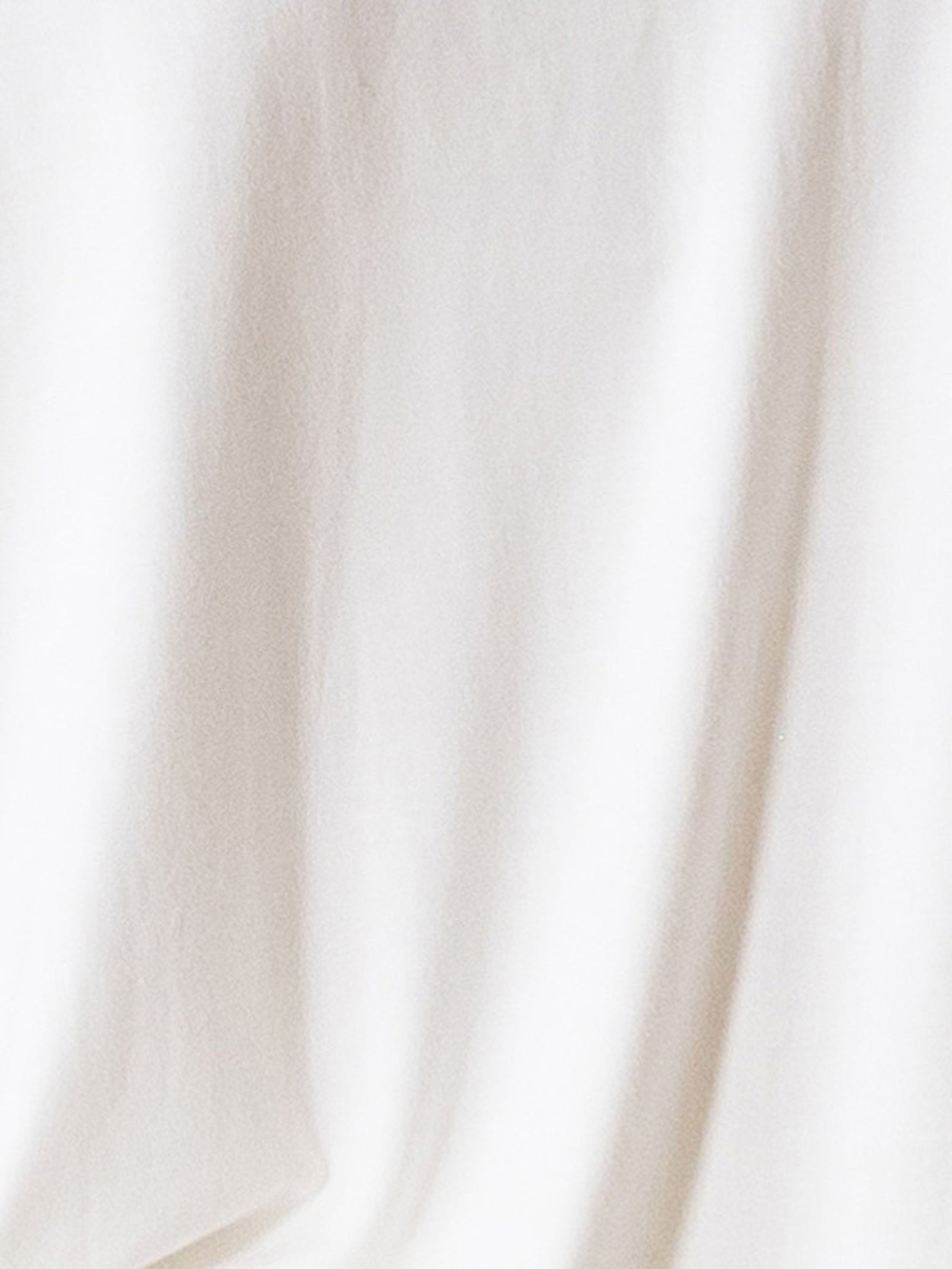 Close up of Ivory pajama fabric