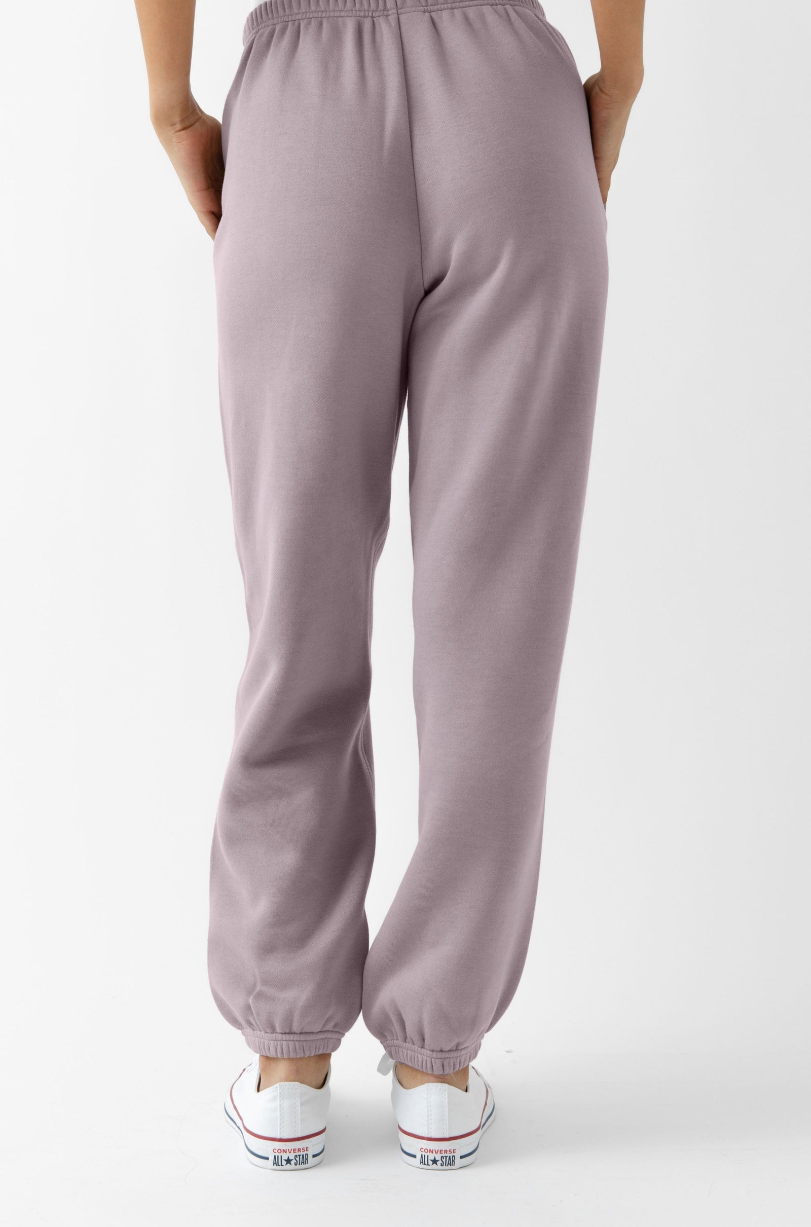 Back view of dusty orchid cityscape sweats with white background