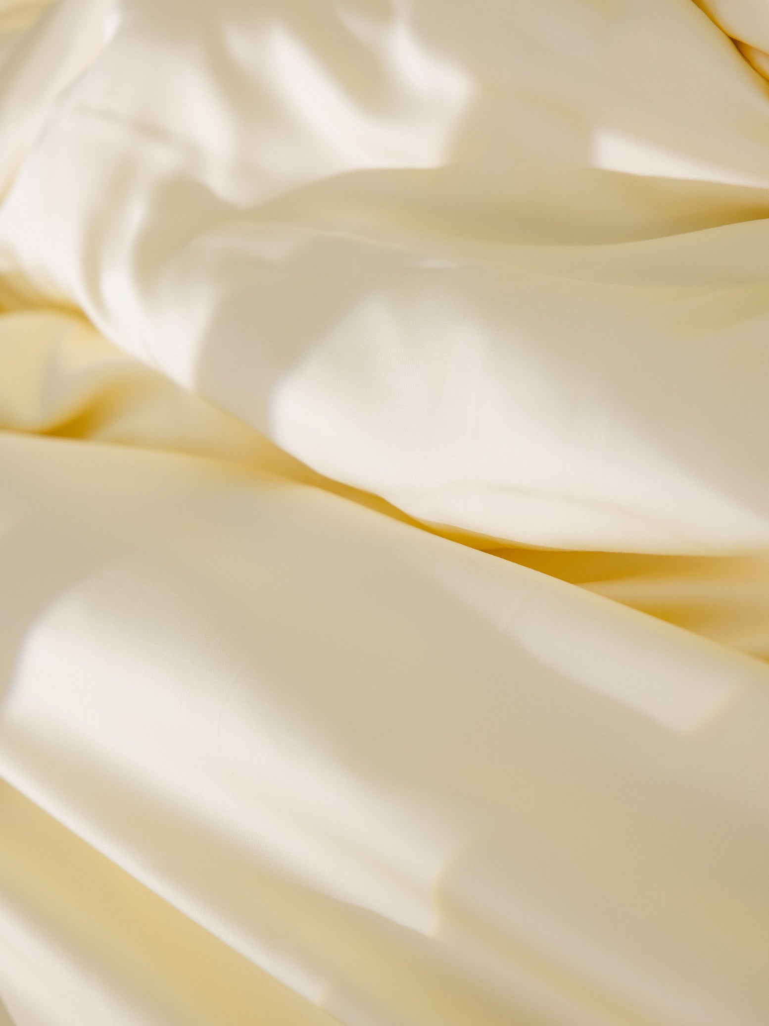 Lemonade Sheets on bed. Photo taken close up.