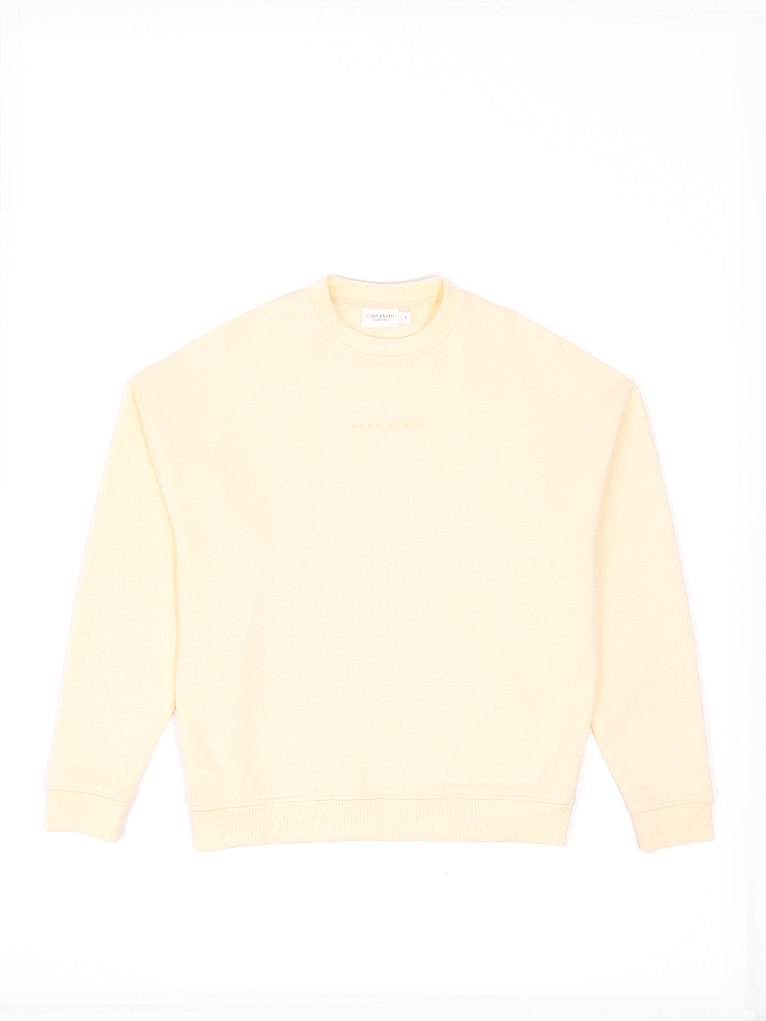 Flat lay of lemonade cityscape pullover