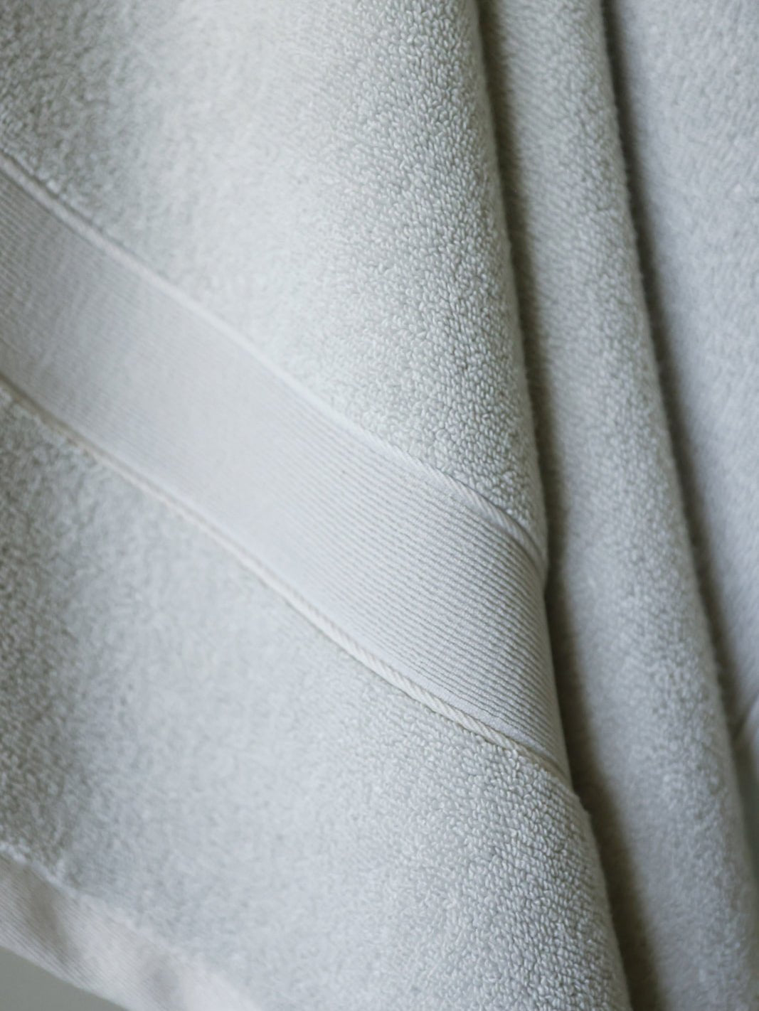 Close up of light grey luxe bath sheet