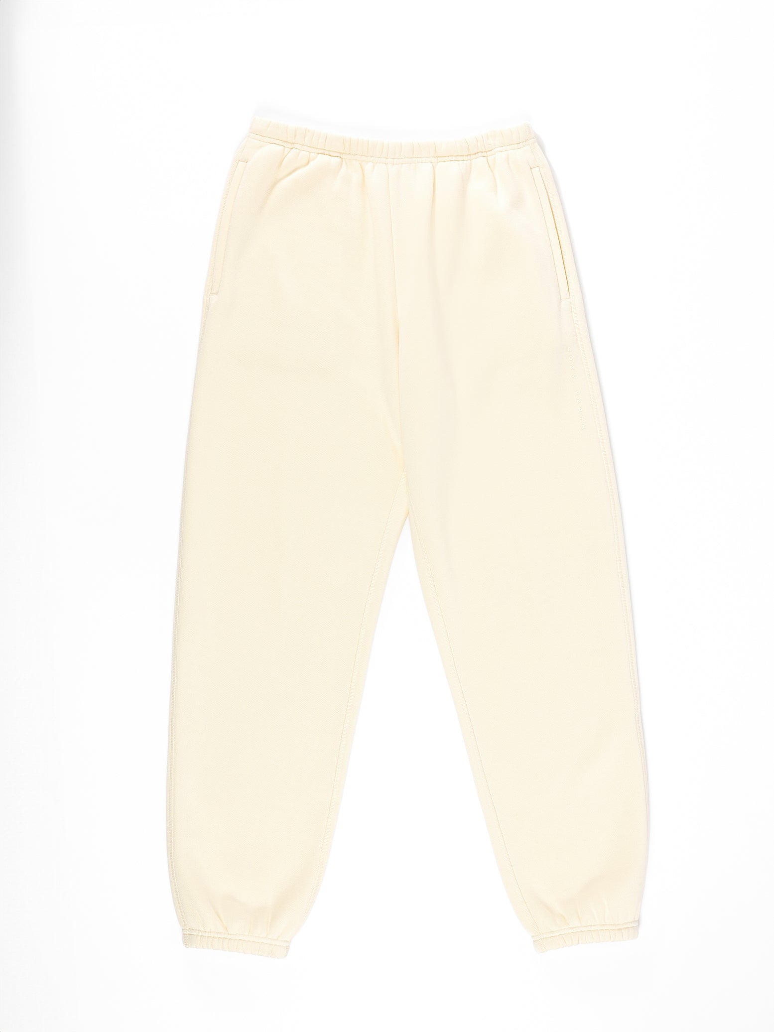 Flat lay of alabaster cityscape sweats with white background