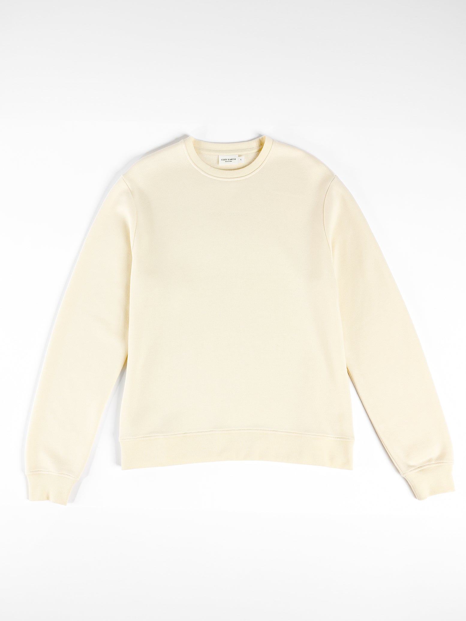 Flat lay of alabaster cityscape crewneck with white background