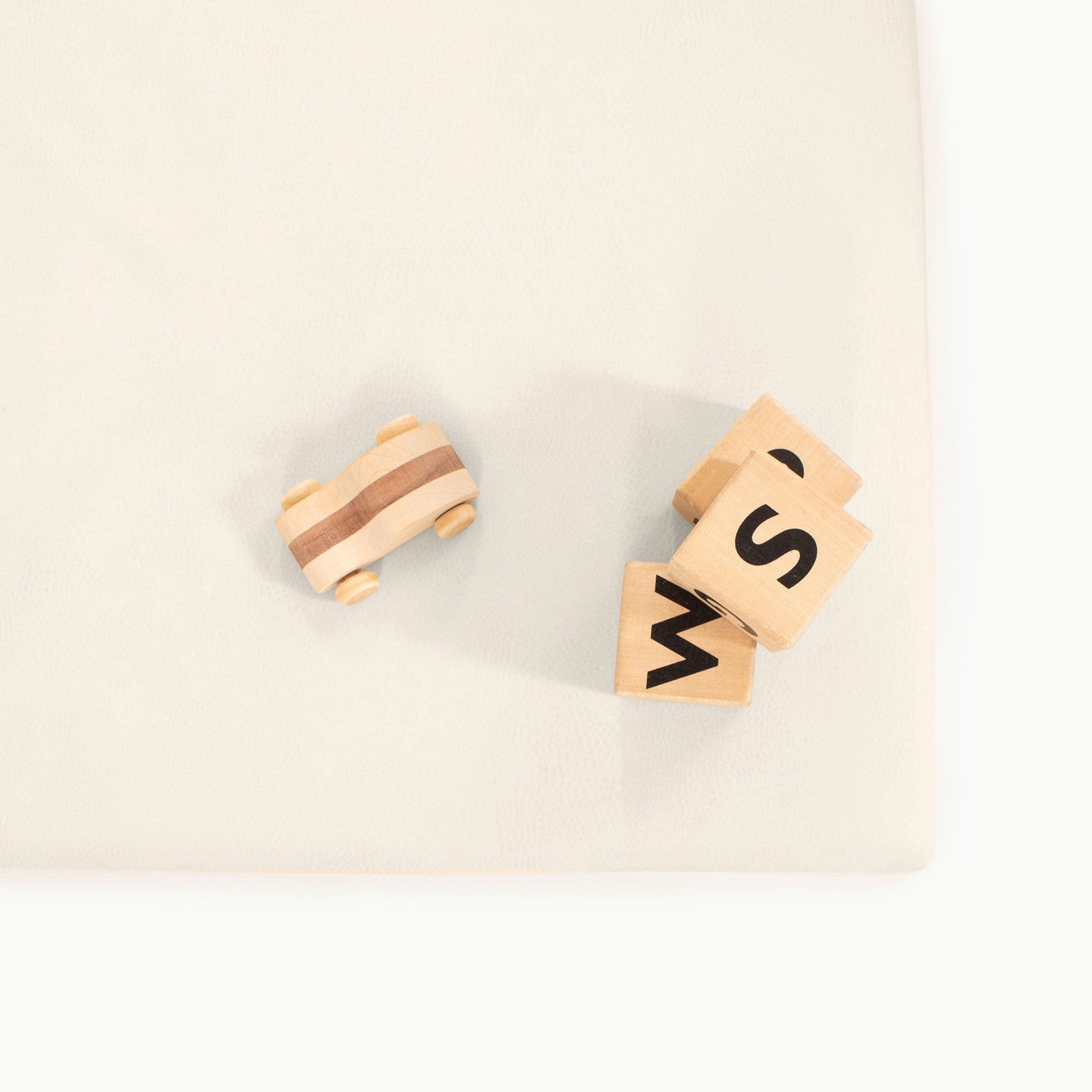 A Wholesale Padded Changing Mat by Gathre is displayed on a light-colored surface.